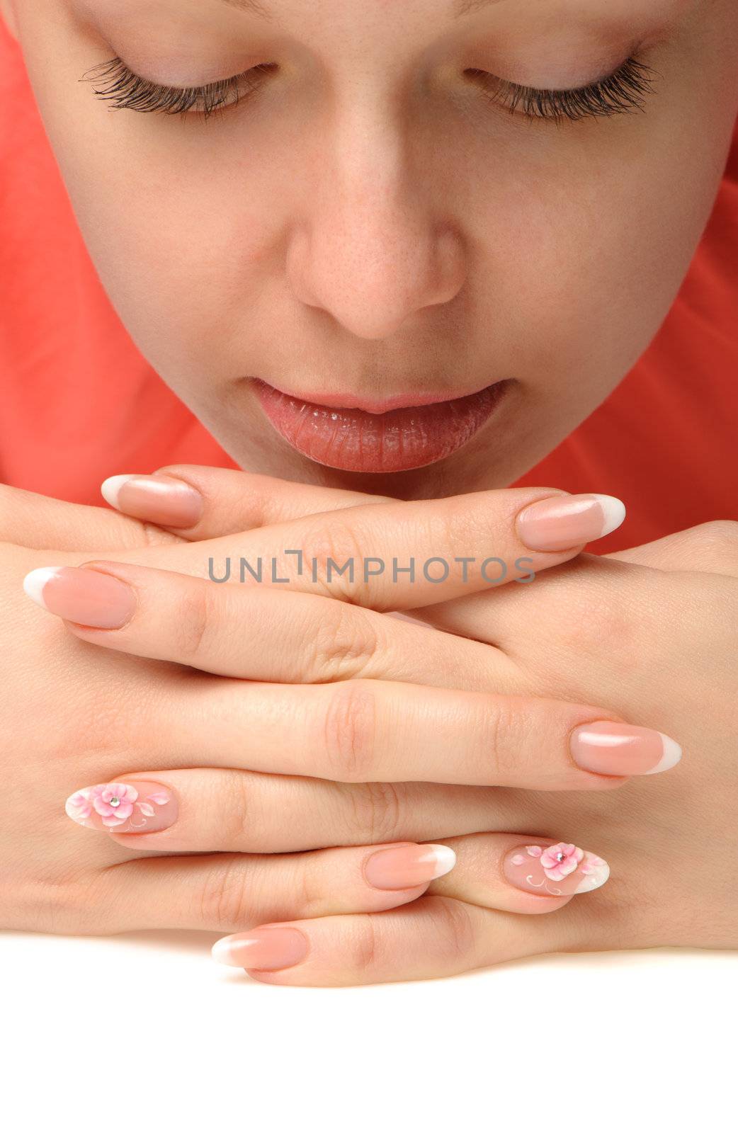 Manicure. Well-groomed female hands with a decorative element - a flower