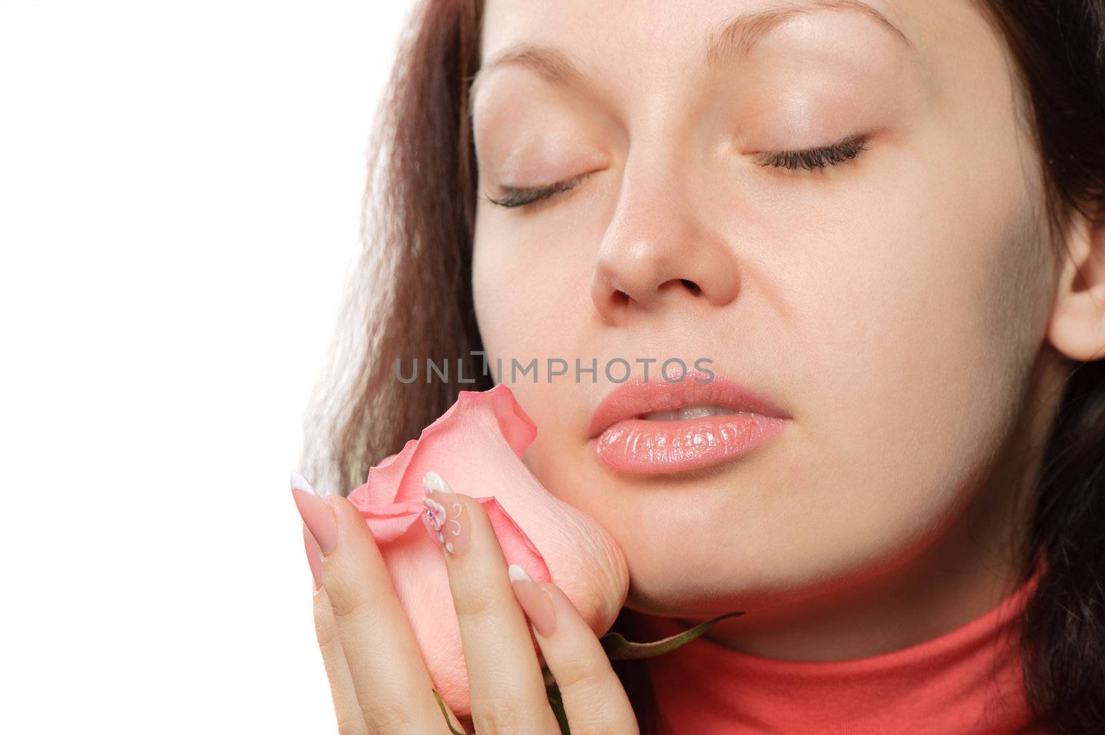 The woman with a rose closeup. Isolated on white