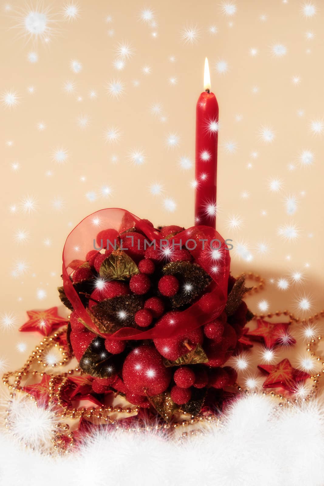 kissing ball against a snowing background with candles