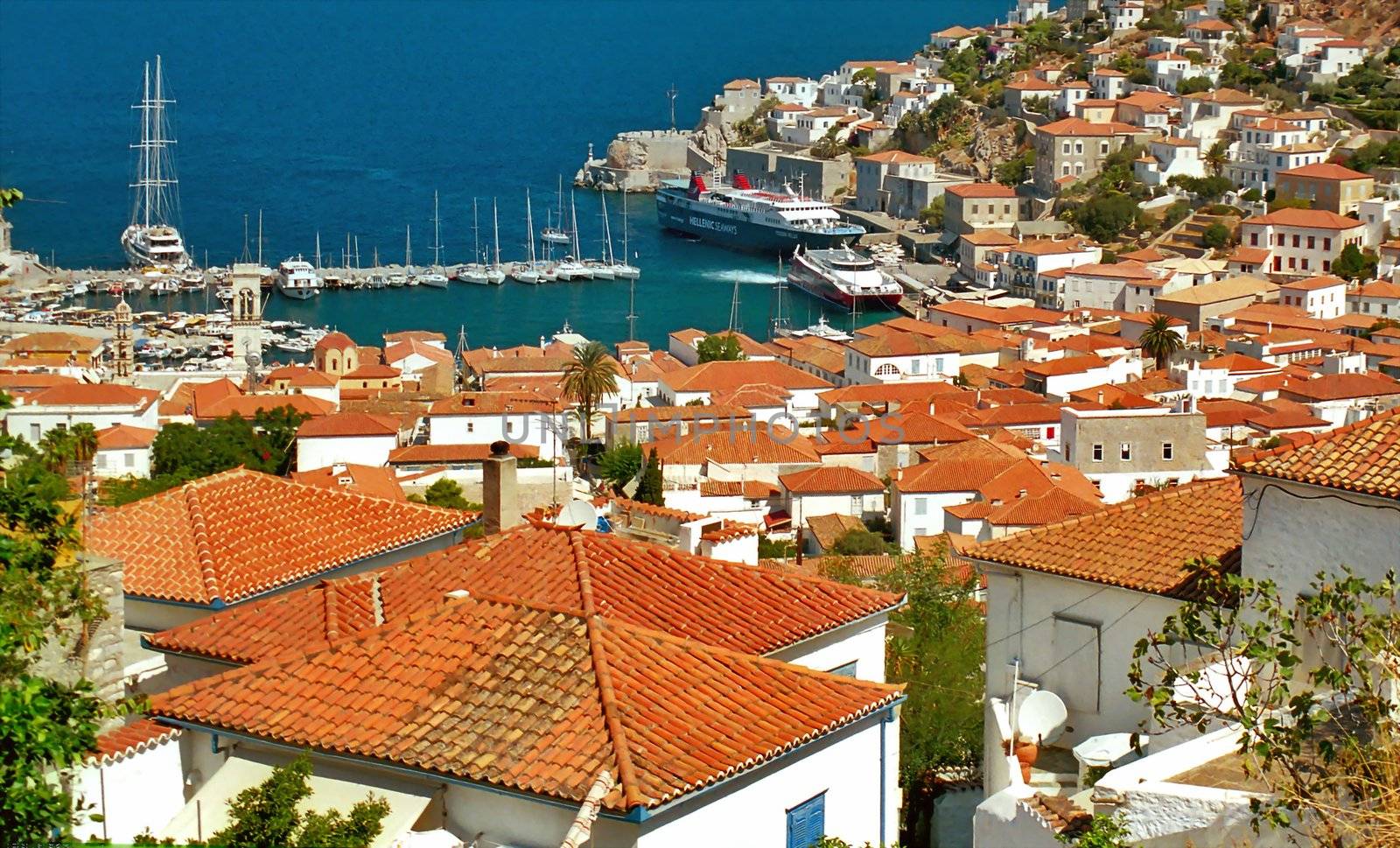 View from the hill: port, houses with red roofs