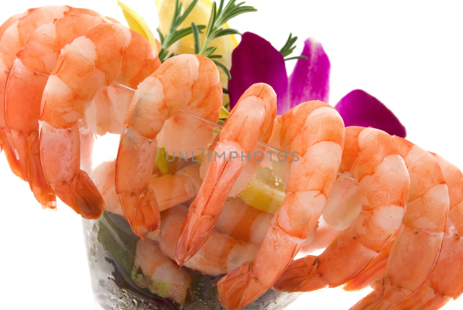 Gourmet large shrimp cocktail with beautiful exotic orchids