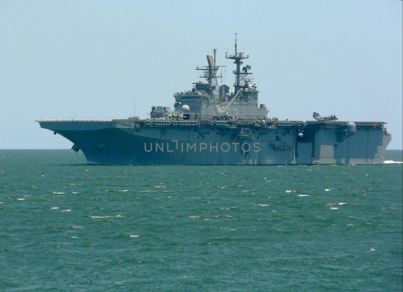 Aircraft carrier entering Chesapeake Bay near Virginia, USA. 