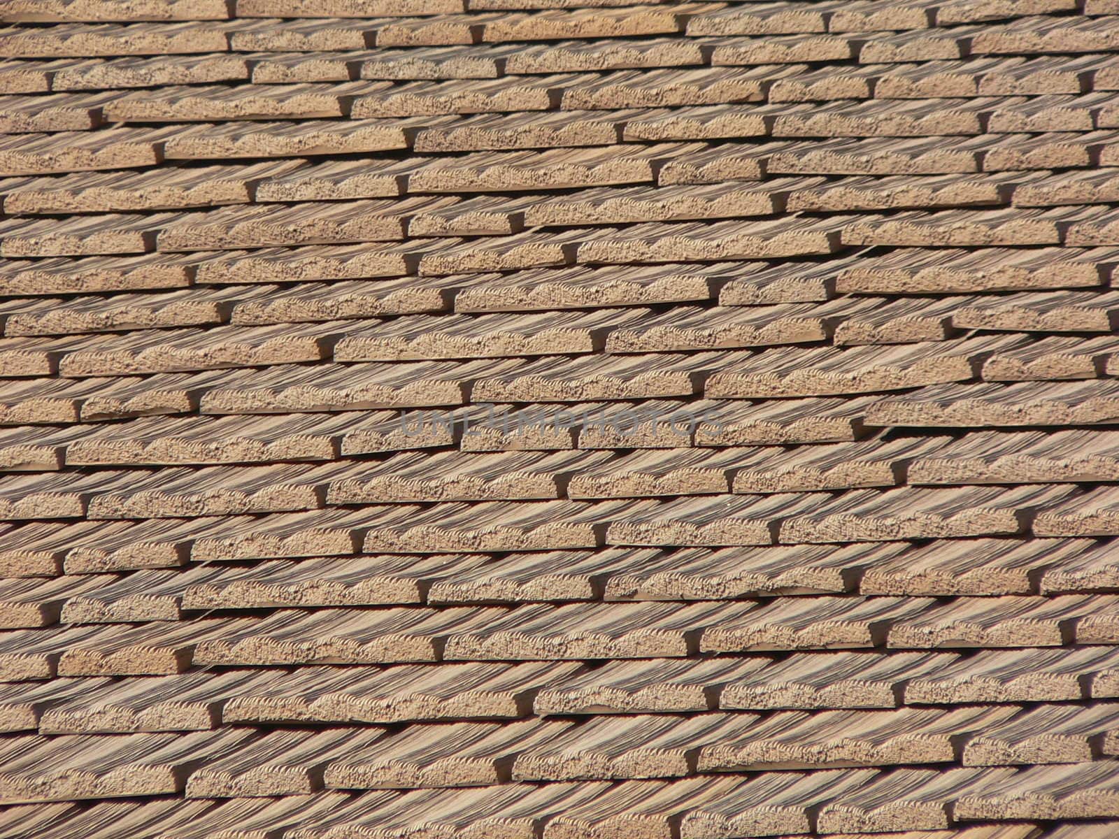 Brown synthetic shingles.