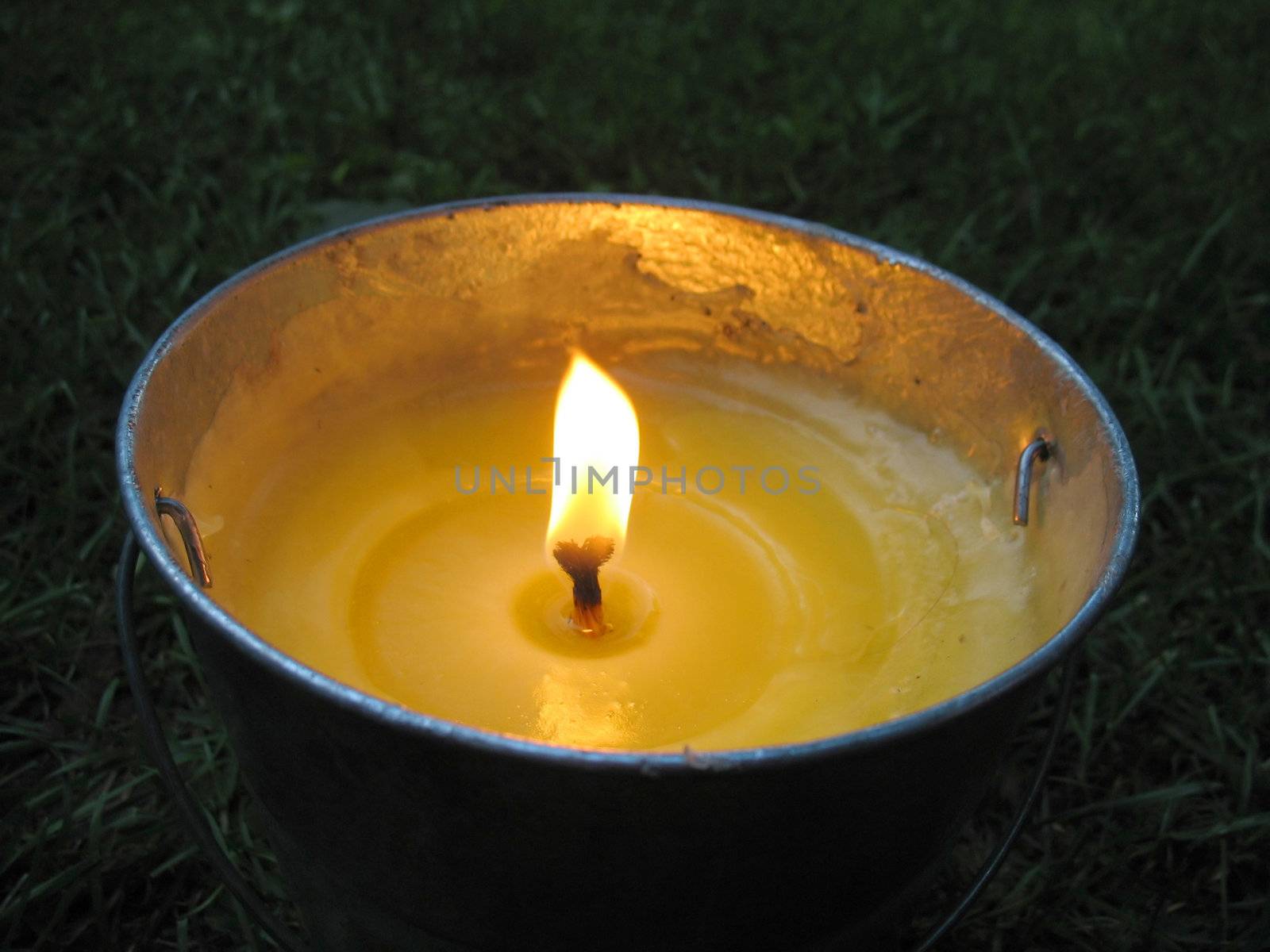 A yellow citronella bucket candle - perfect for those summertime evenings to keep the mosquitos away.