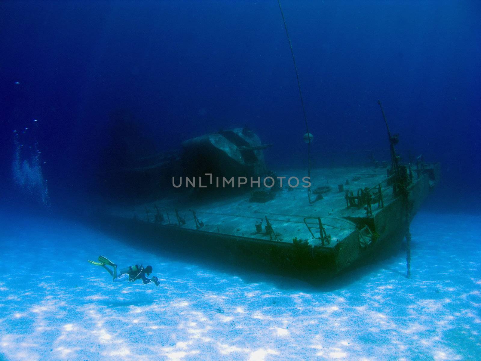 Videographer filming a sunken Shipwreck by KevinPanizza