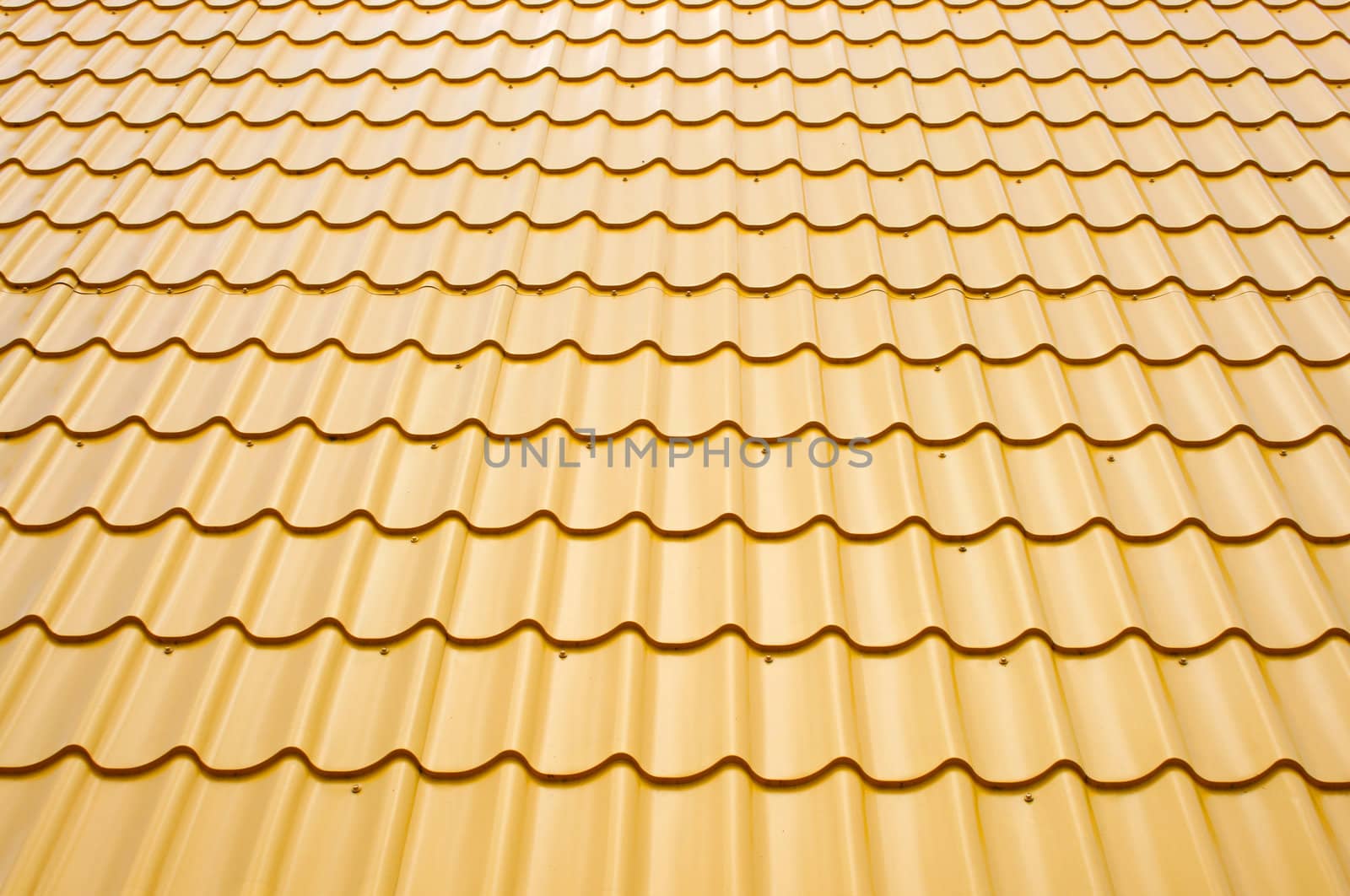 a roof is covered a yellow wavy metal, background