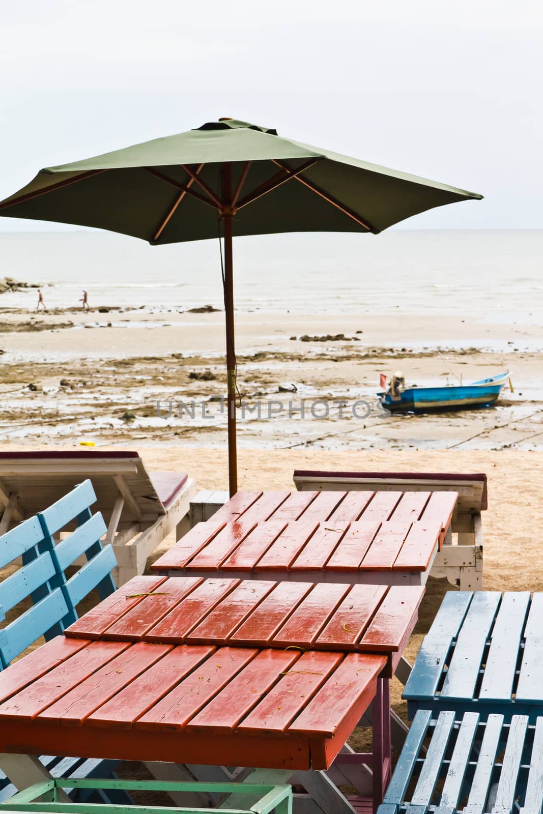 Tables, chairs, colorful seaside by Na8011seeiN