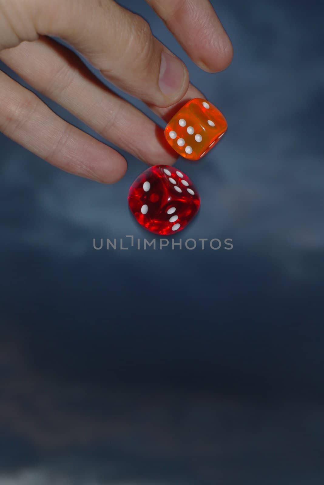 hand throwing dices.