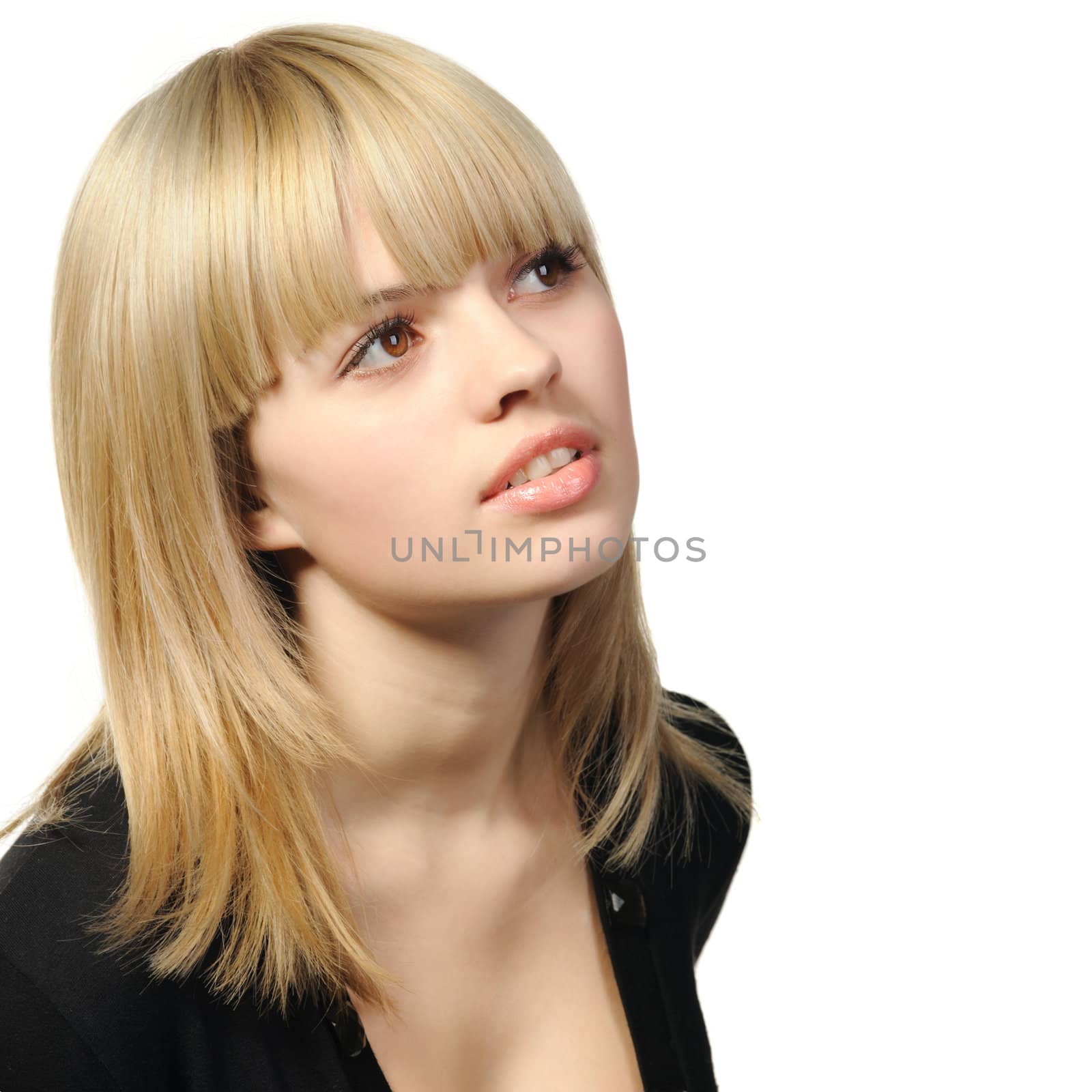 The girl with hair of "wheaten" color. It is isolated on a white background