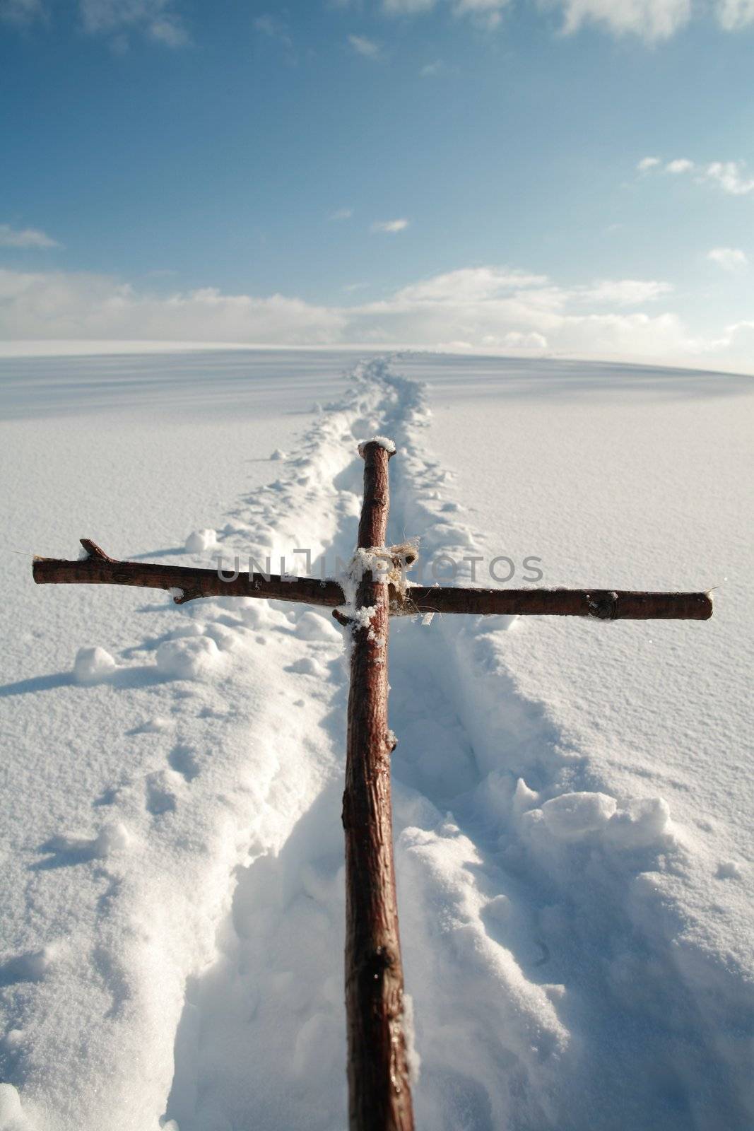 Cross in winterscene