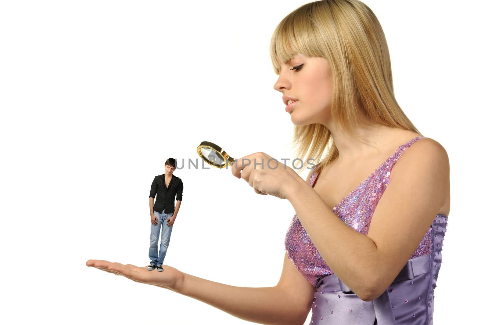 The girl considering the guy through a magnifier. The potential groom.It is isolated on a white background