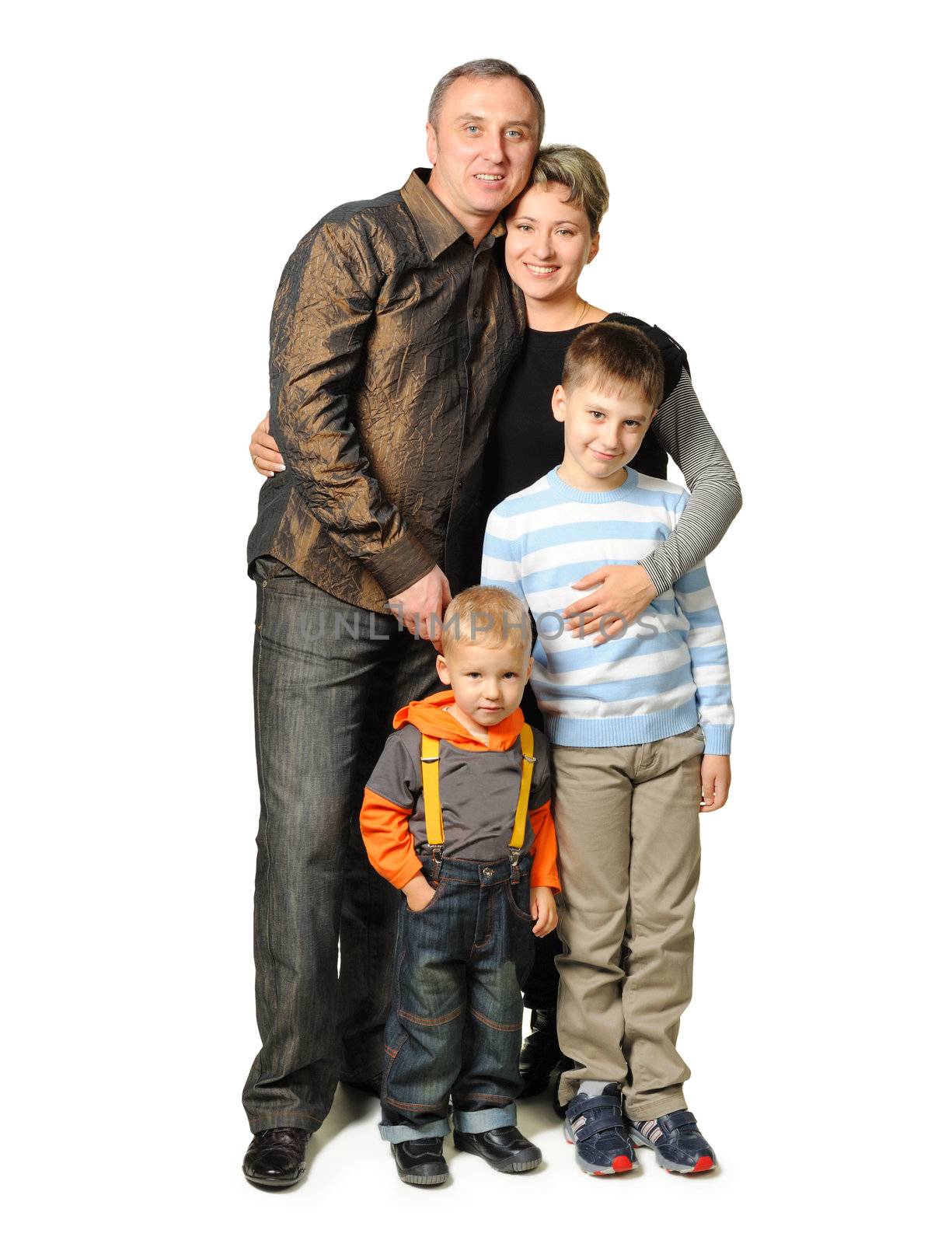 Happy family. The daddy, mum, two sons. It is isolated on a white background.