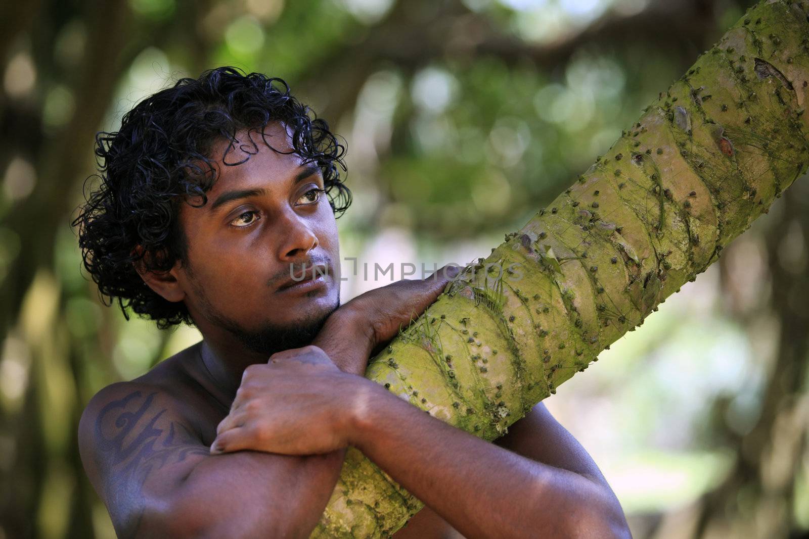 Portrait young men on a green background. Sri Lanka