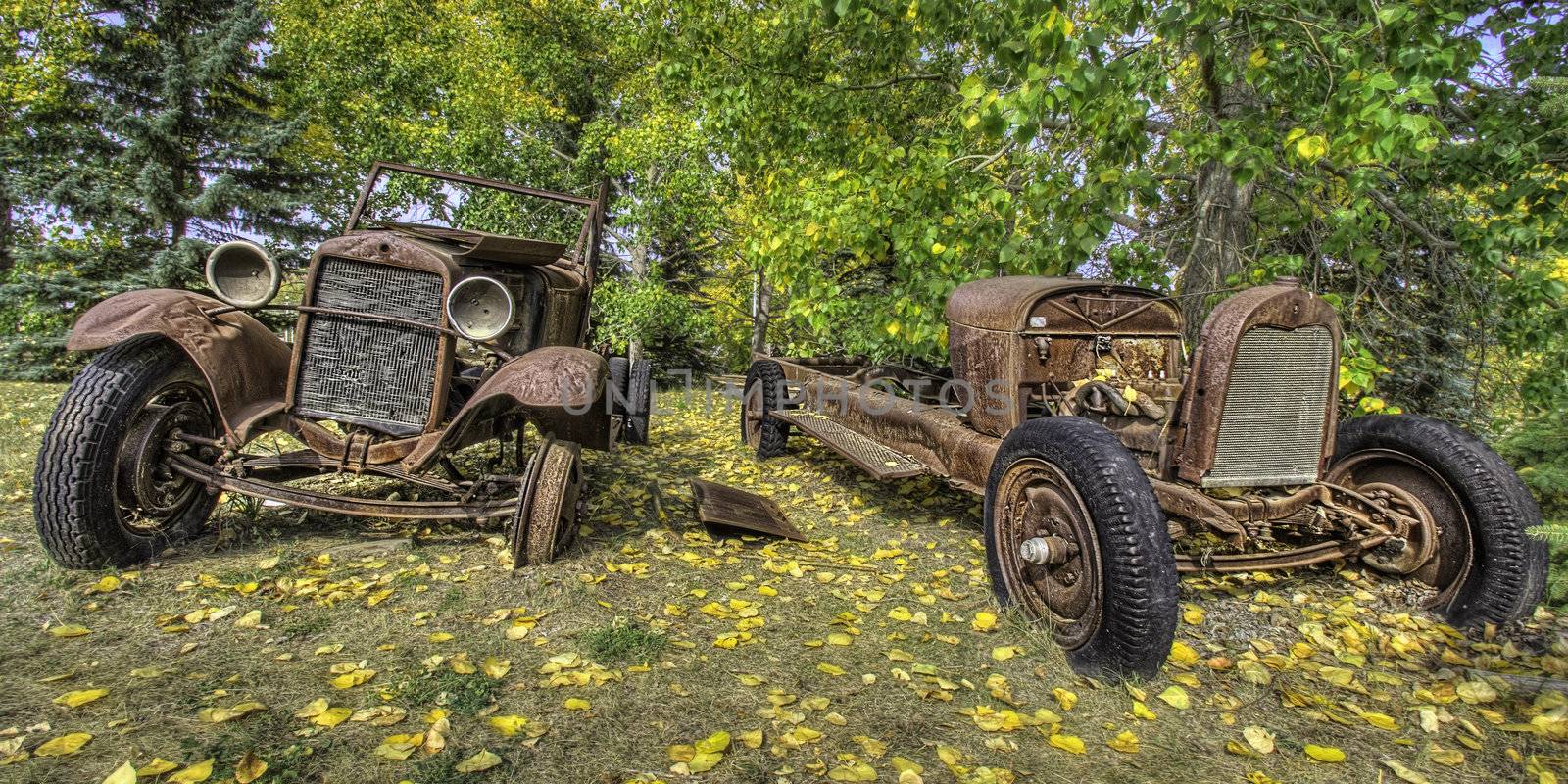 The remnants of two very old vehicles I discovered at Fort Edmonton in Edmonton, Alberta, Canada.