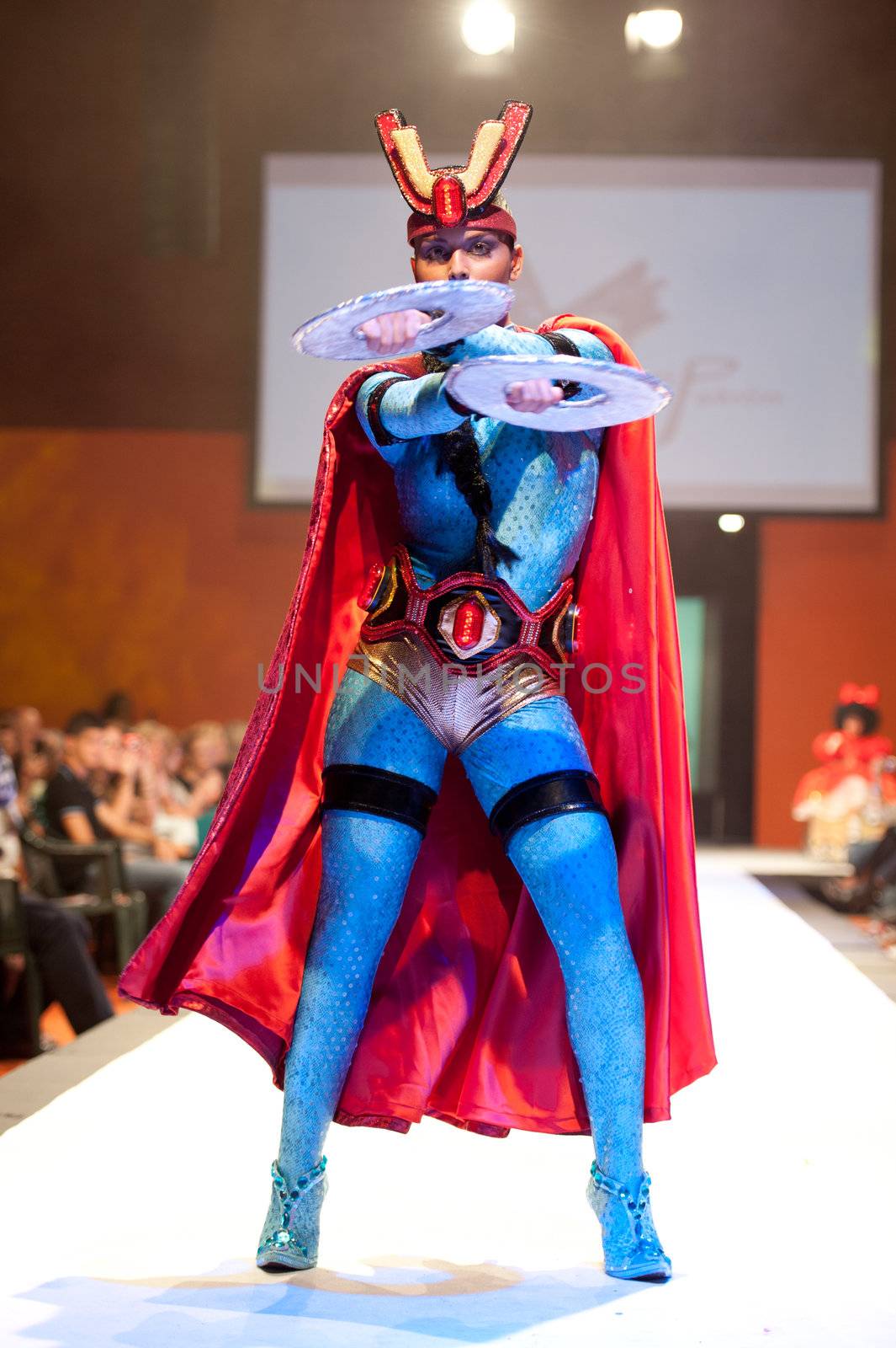 CANARY ISLANDS - 29 OCTOBER: Model on the catwalk wearing carnival costume from designer Mari Patron Dominguez during Carnival Fashion Week October 29, 2011 in Canary Islands, Spain