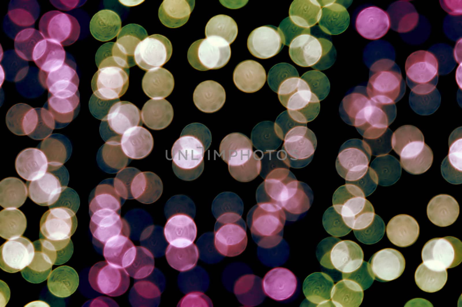 Out of focus colorful light dots. Abstract background.