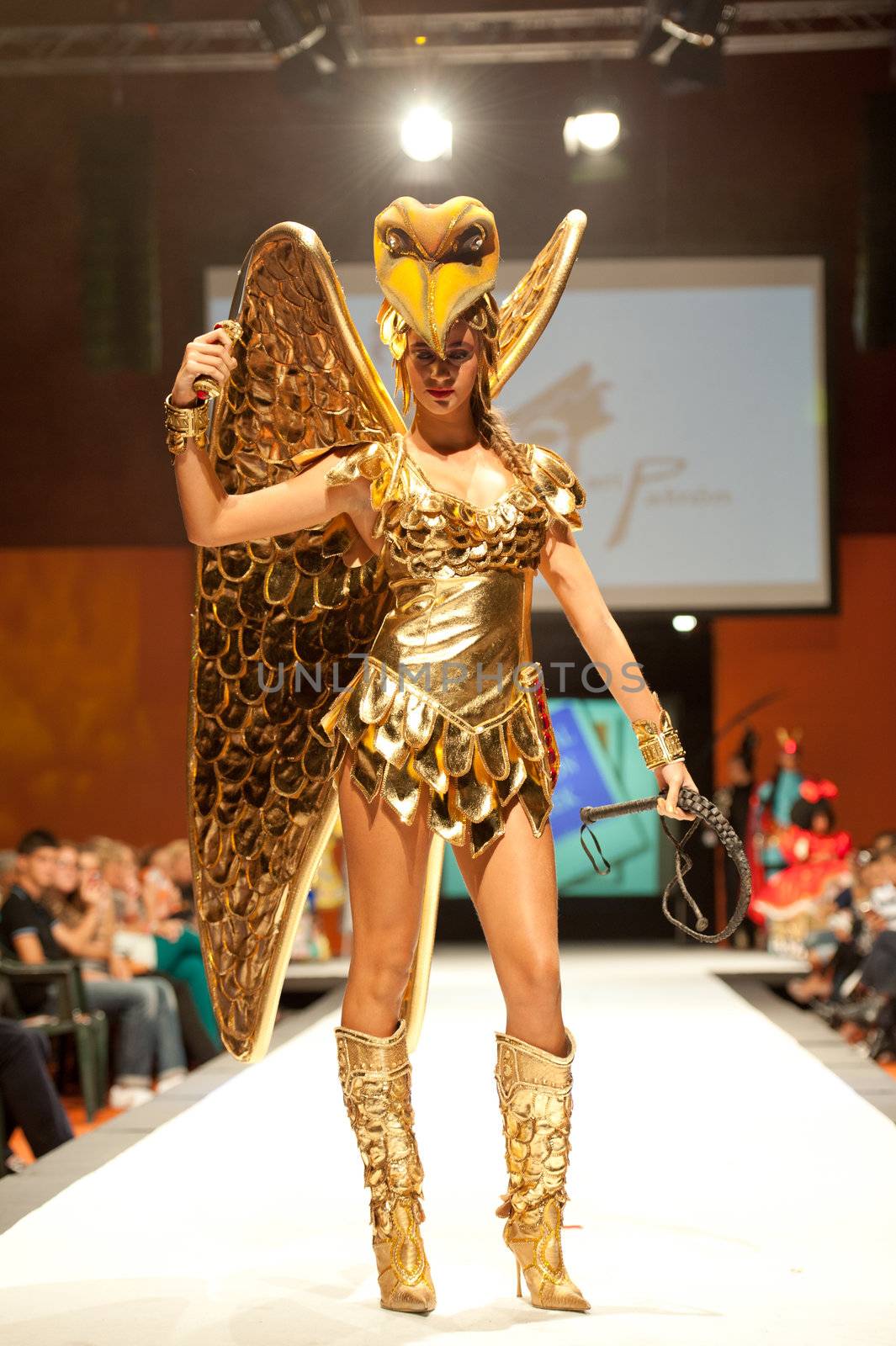CANARY ISLANDS - 29 OCTOBER: Model on the catwalk wearing carnival costume from designer Mari Patron Dominguez during Carnival Fashion Week October 29, 2011 in Canary Islands, Spain
