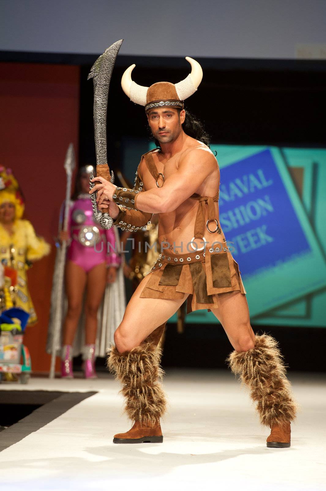 CANARY ISLANDS - 29 OCTOBER: Model on the catwalk wearing carnival costume from designer Mari Patron Dominguez during Carnival Fashion Week October 29, 2011 in Canary Islands, Spain