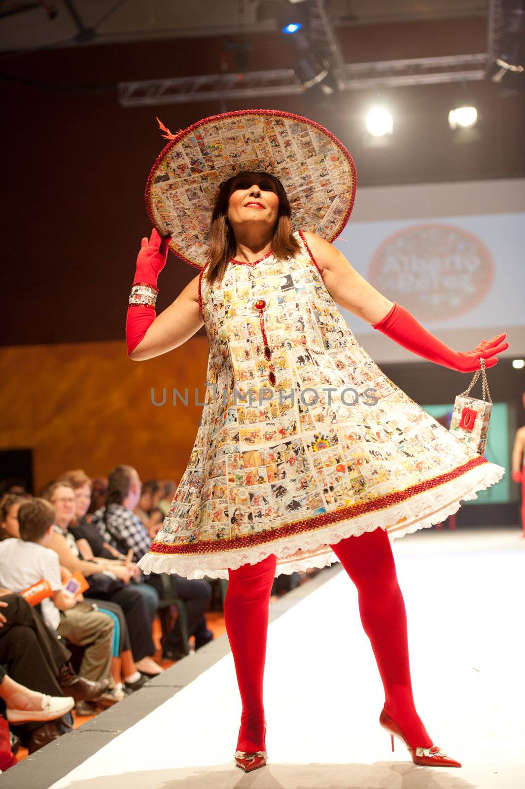 CANARY ISLANDS - 29 OCTOBER: Model on the catwalk wearing carnival costume from designer Alberto Perez during Carnival Fashion Week October 29, 2011 in Canary Islands, Spain