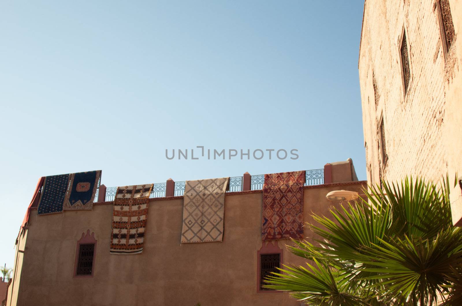 Moroccan building with newly produced Berber carpets in the Medina of Marrakech