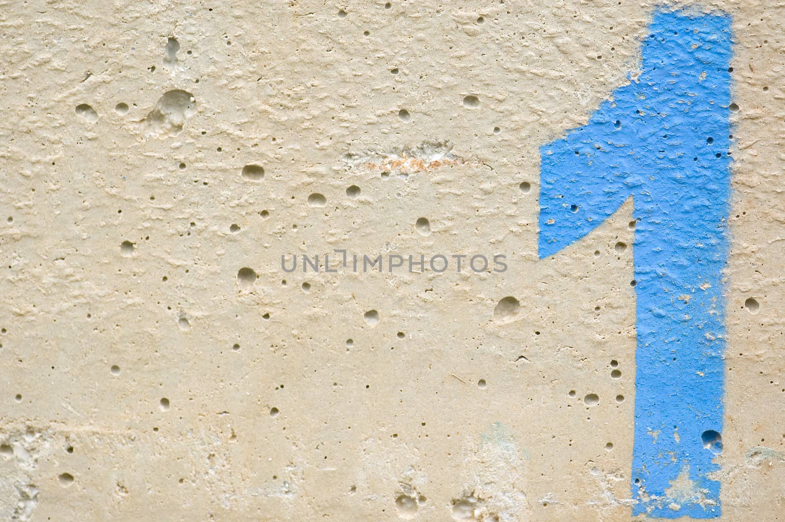 Number one stencil sprayed on rough concrete surface. Background texture.