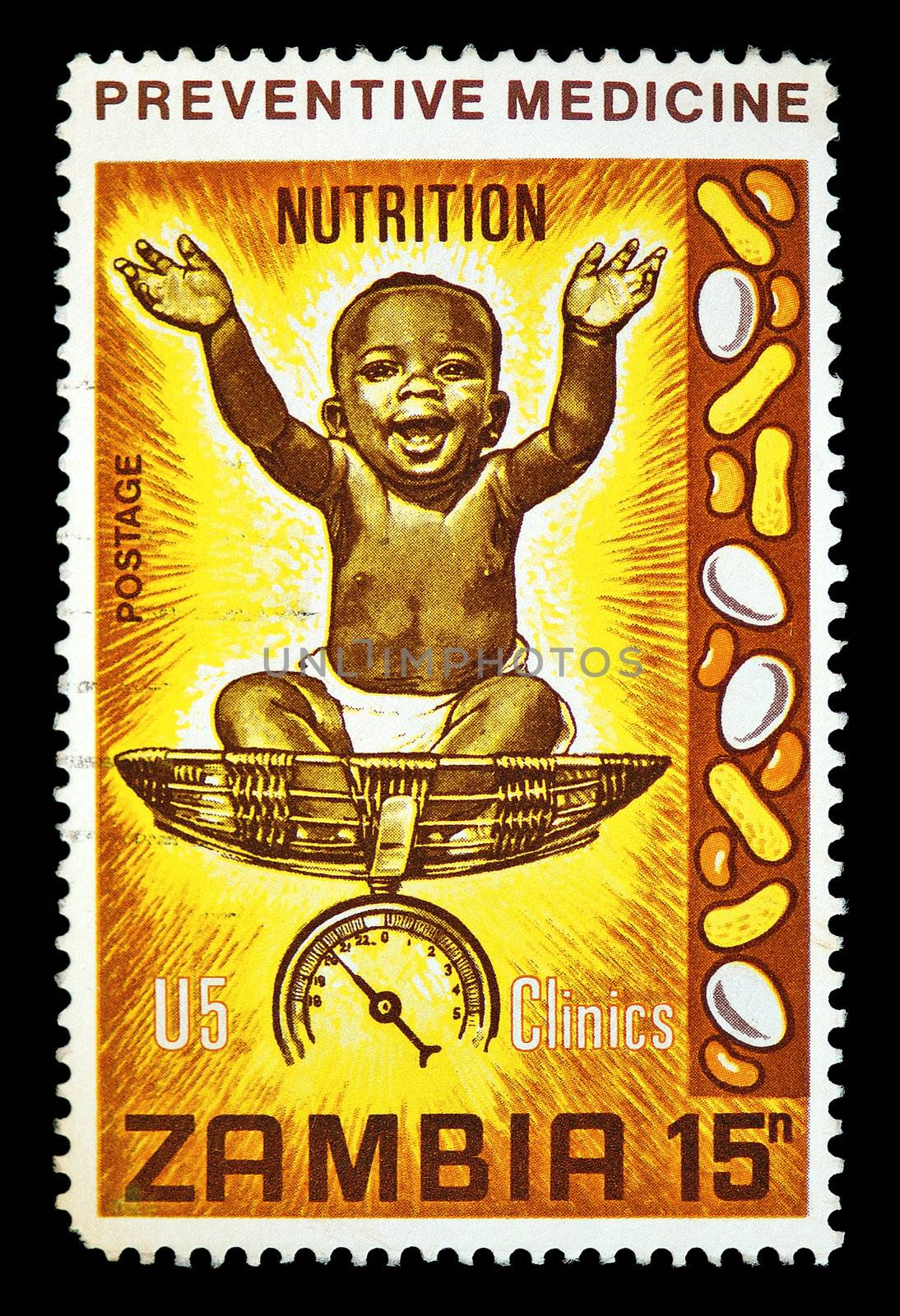 Vintage cancelled postage stamp with nutrition preventive medicine illustration. Zambia, Africa, circa 1970.