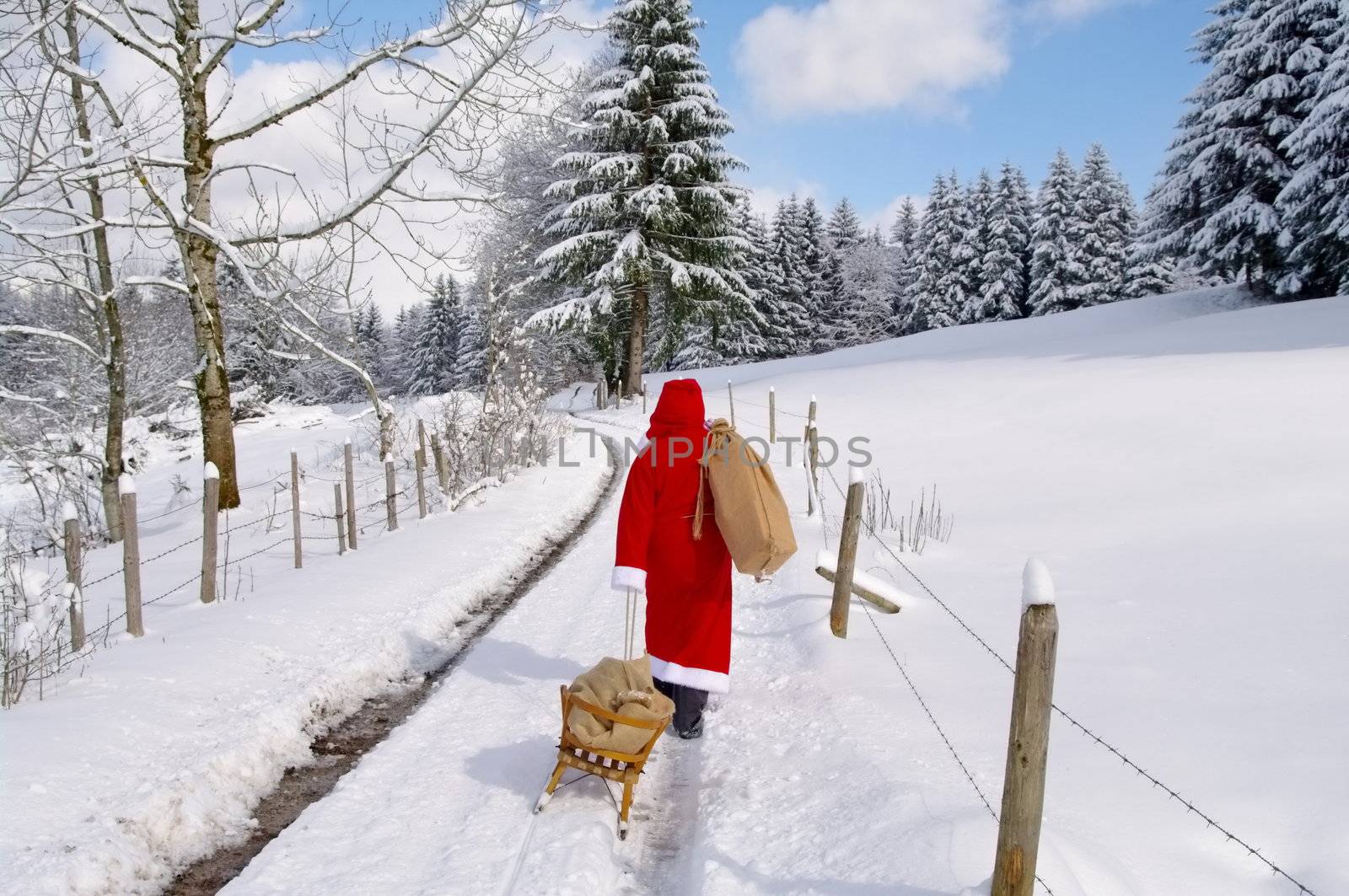 Santa Claus, Father Christmas in a beautiful winter landscape