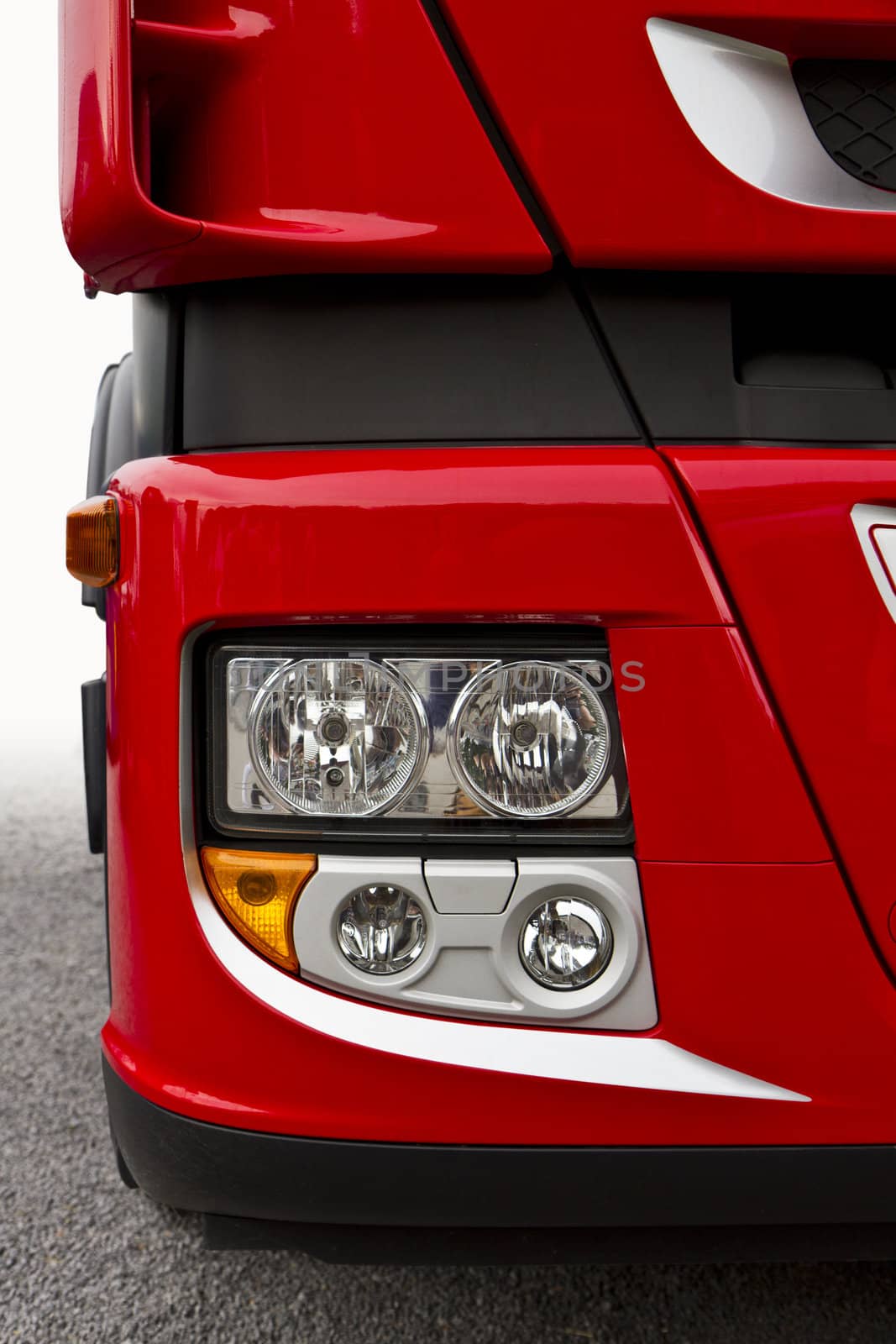 front view of red truck, font light