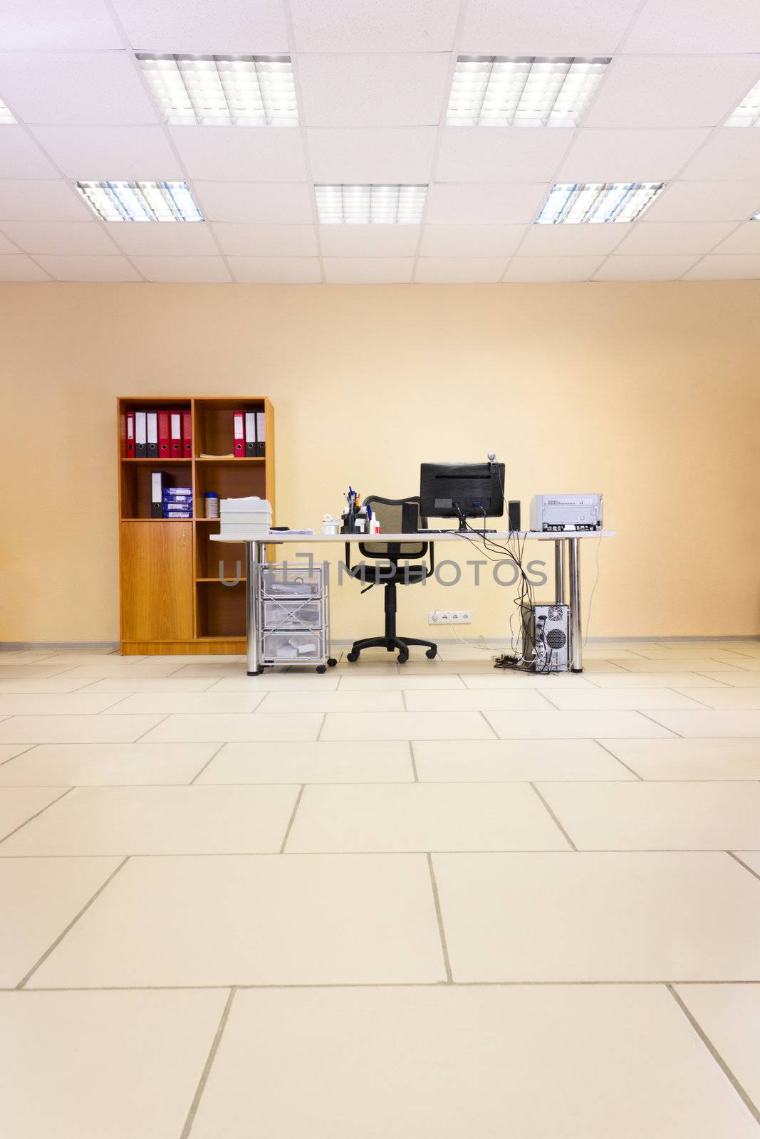 Empty office working place with computer, web camera and space for your text