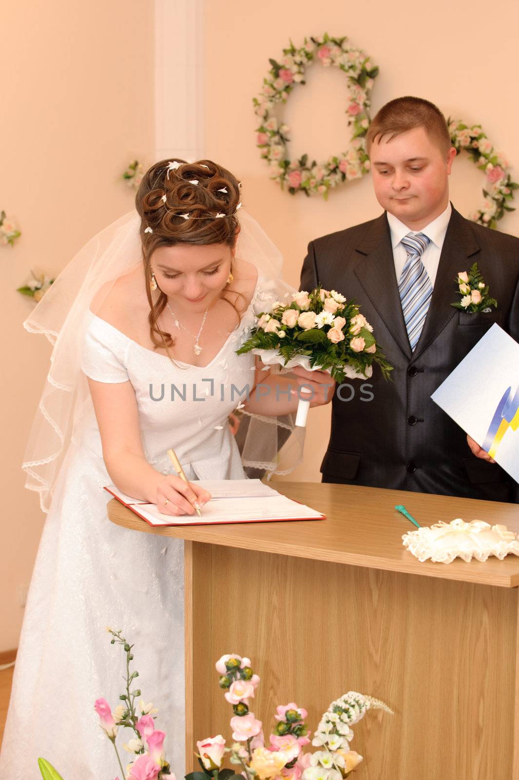 The wedding signature. Ceremony of wedding, a fastening the signature