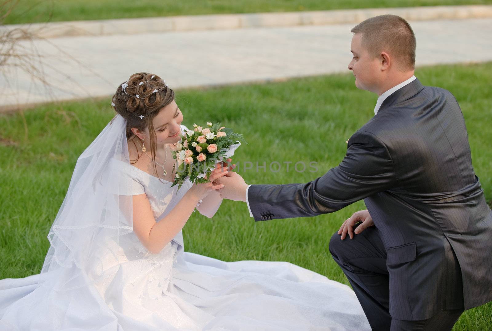 Newly-married couple. Pair young men in wedding day