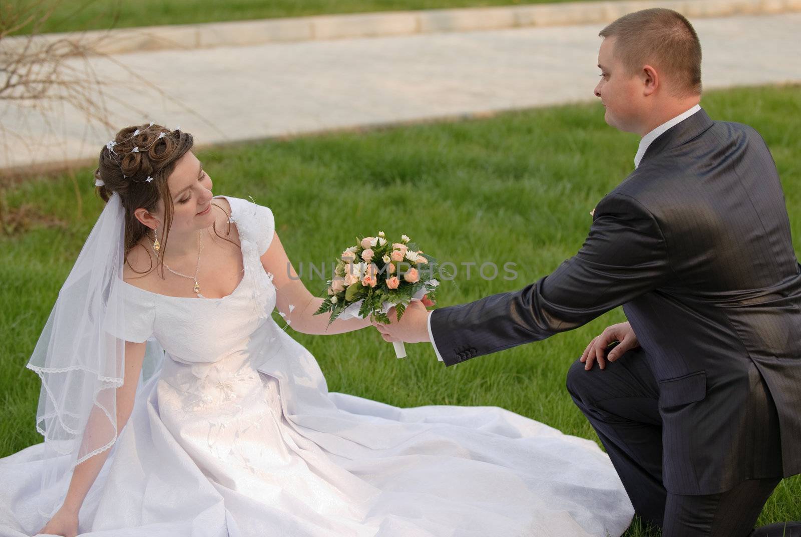 Newly-married couple. Pair young men in wedding day