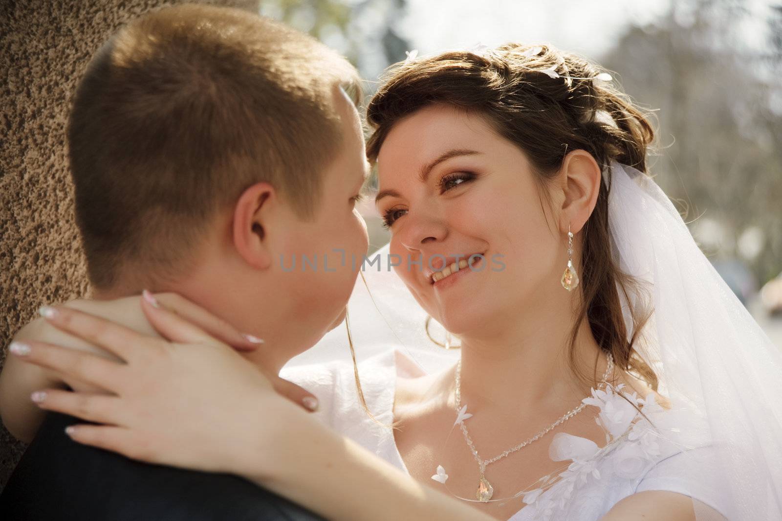 Newly-married couple. Pair young men in wedding day