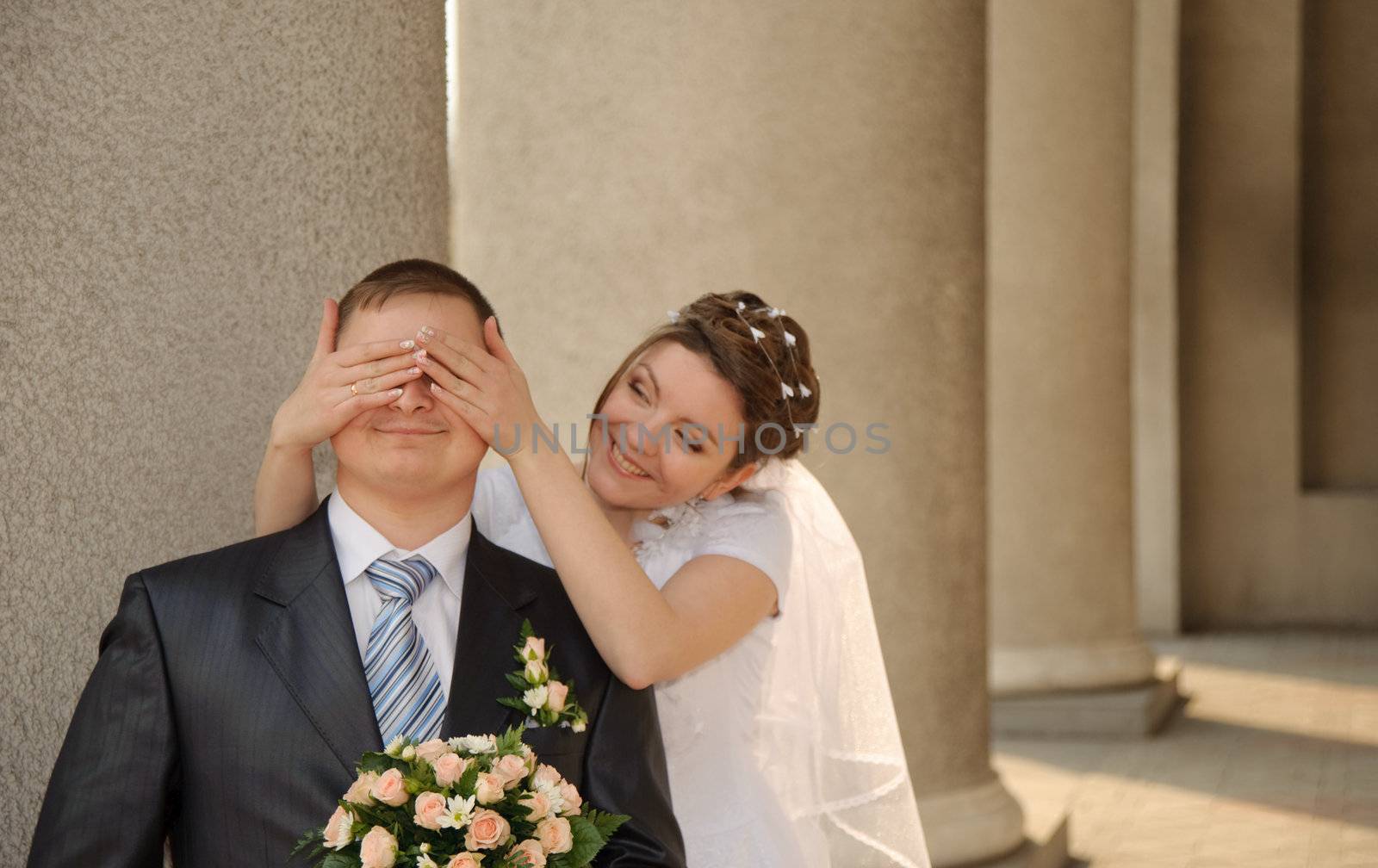 Newly-married couple. Pair young men in wedding day