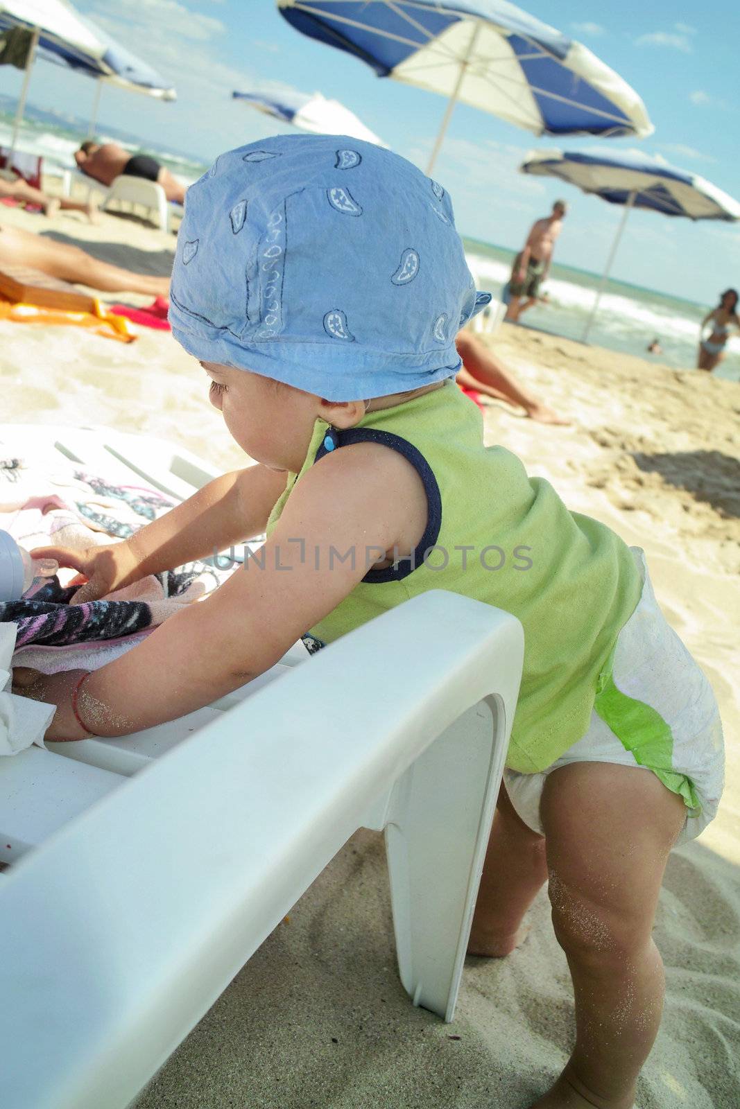 Little boy of the beach by sattva