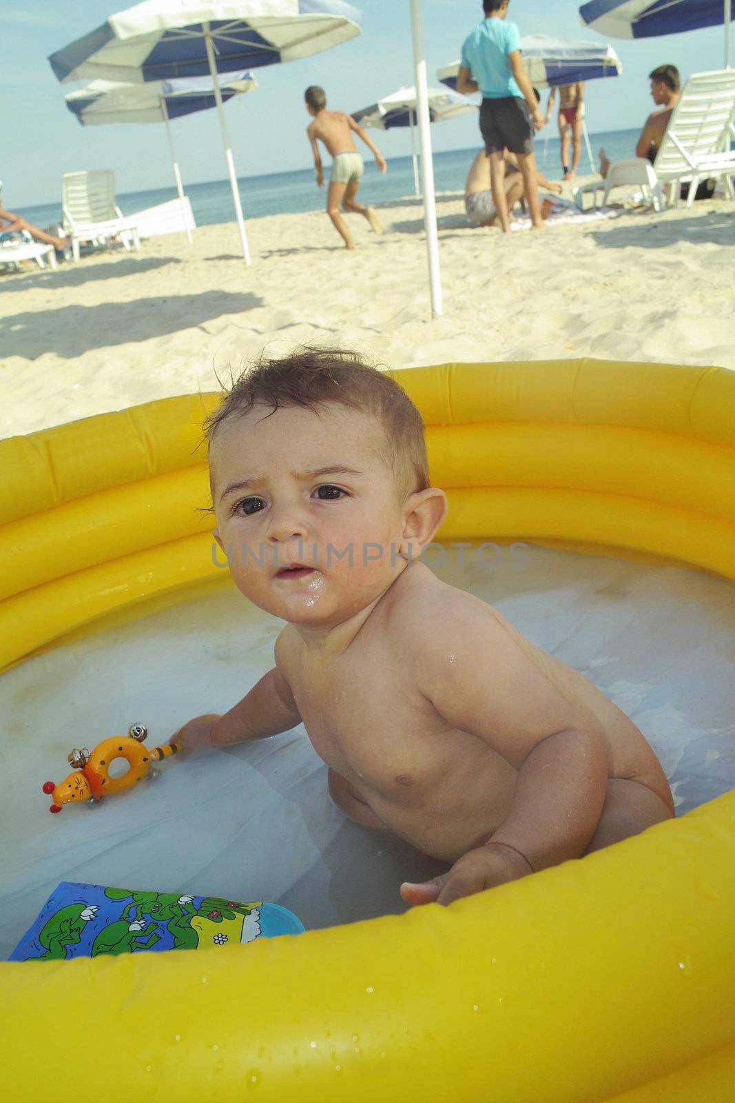 Little boy of the beach by sattva