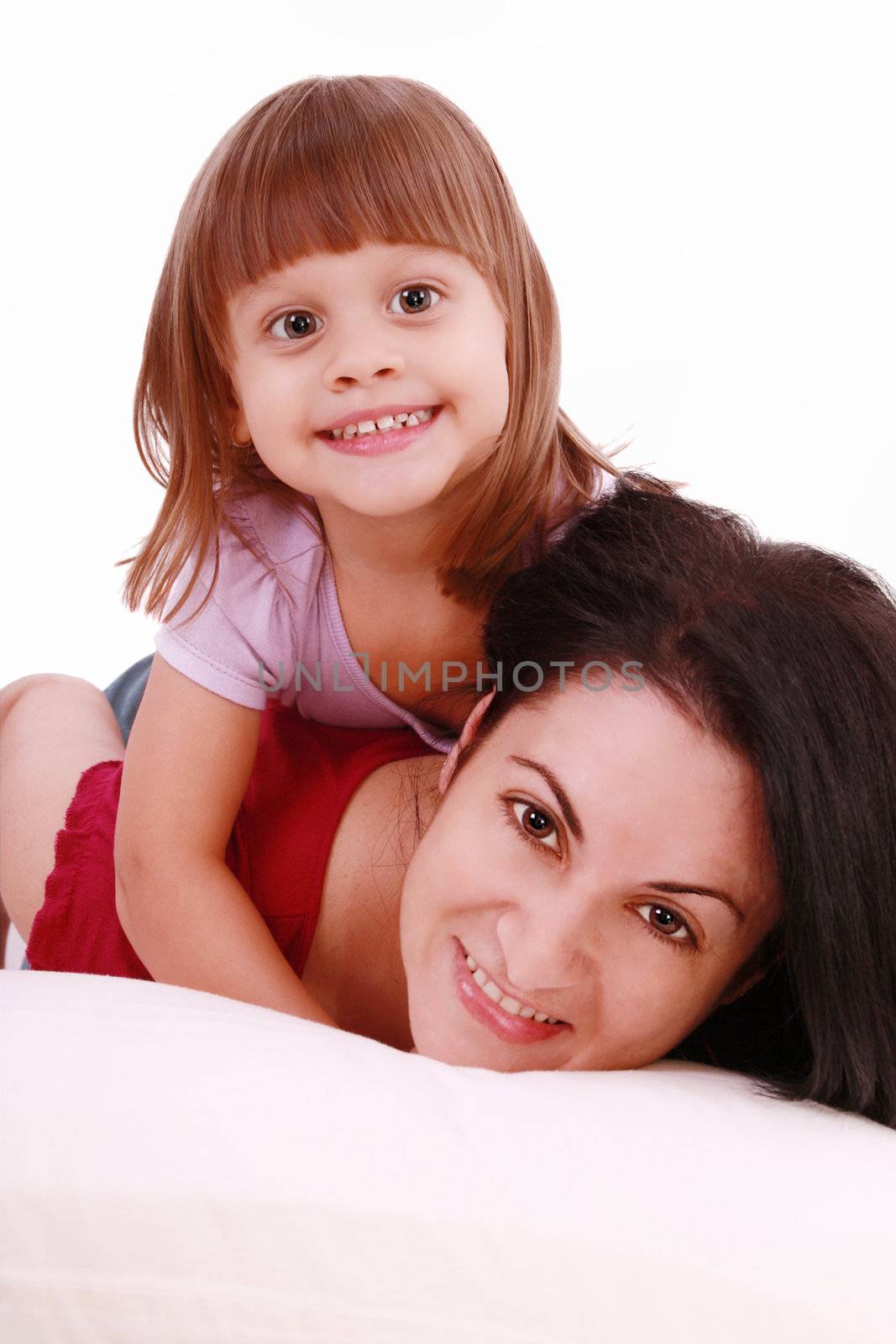 A portrait of a mother and her baby girl lying on the bed and sm by dacasdo