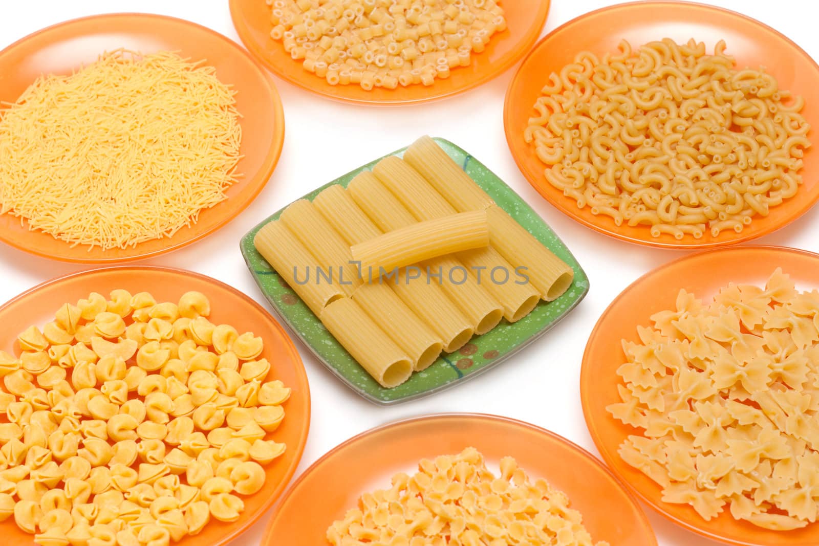 Dry noodle on plate insulated on white background