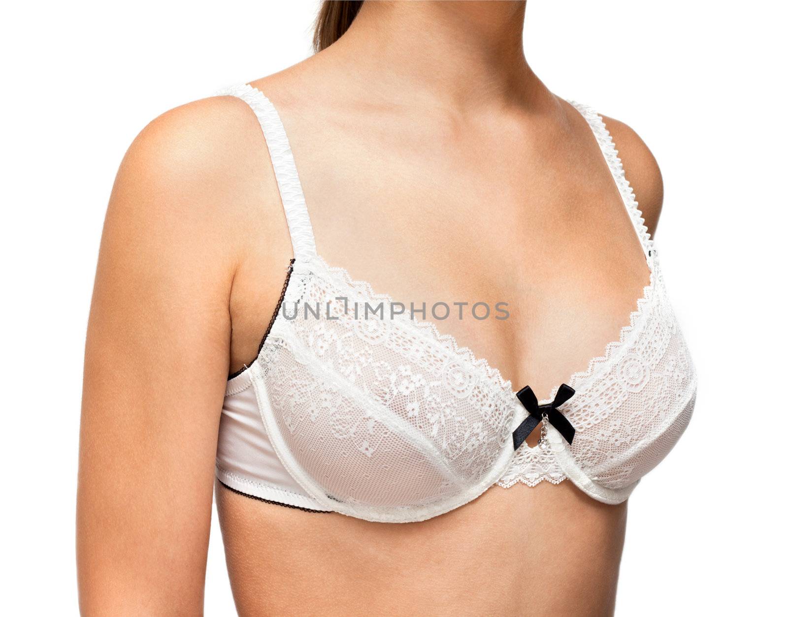 Young girl in white bra with black bow
