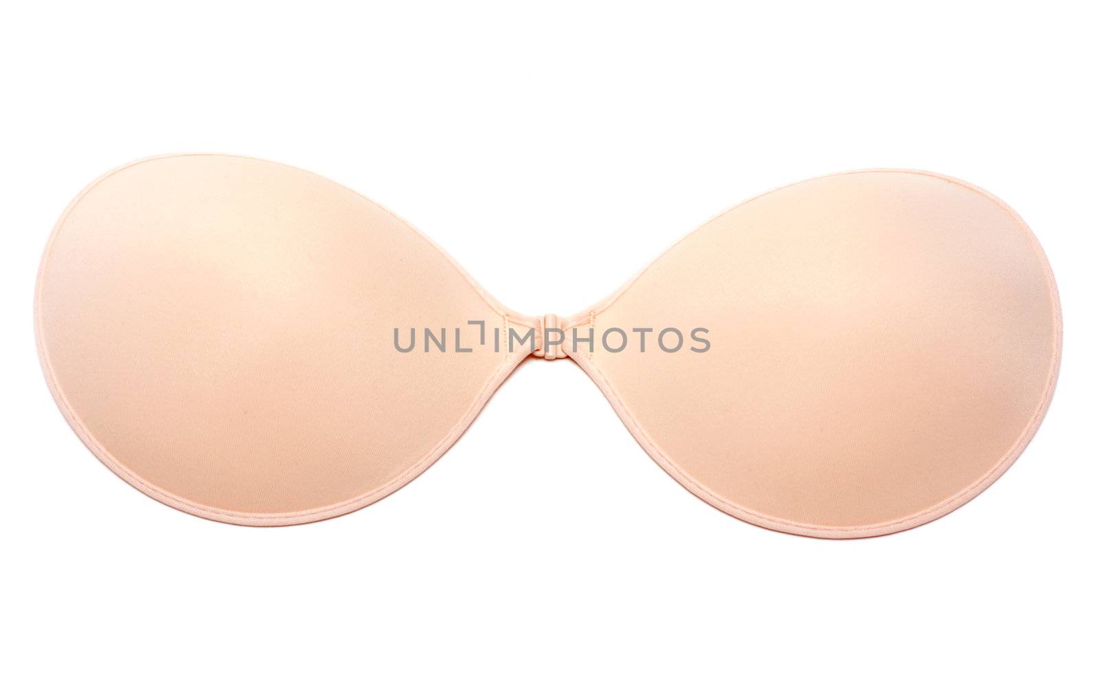 Beige silicone bra insulated on white background