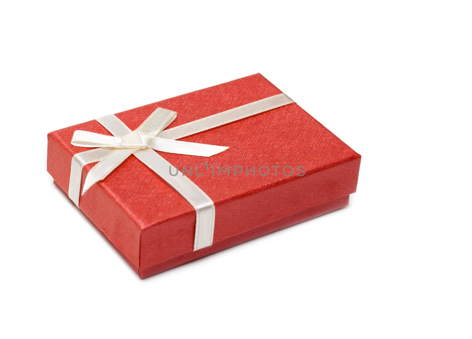 Red gift box, silvery bow isolated on white background