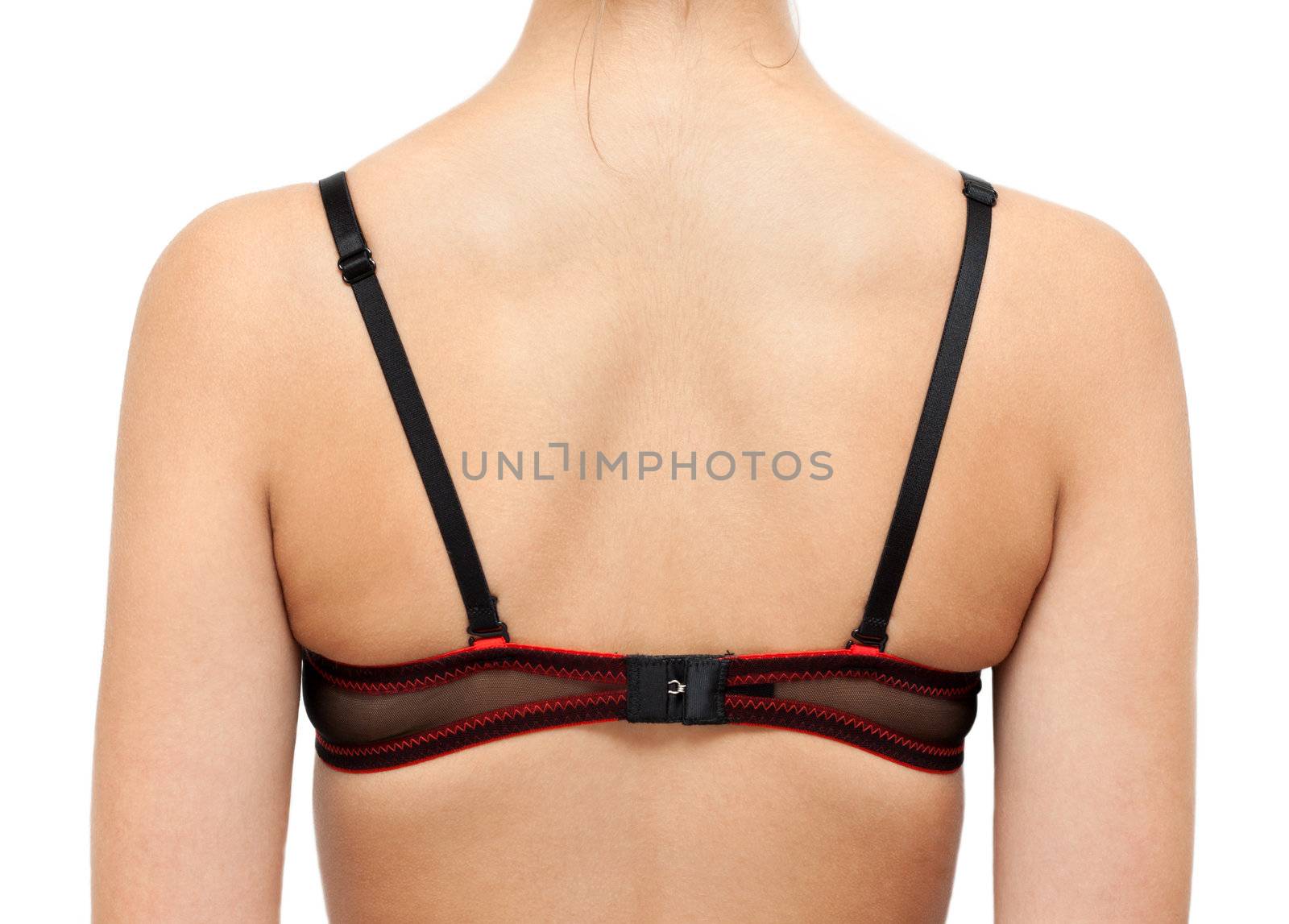 Back of the girl in bra isolated on white 
