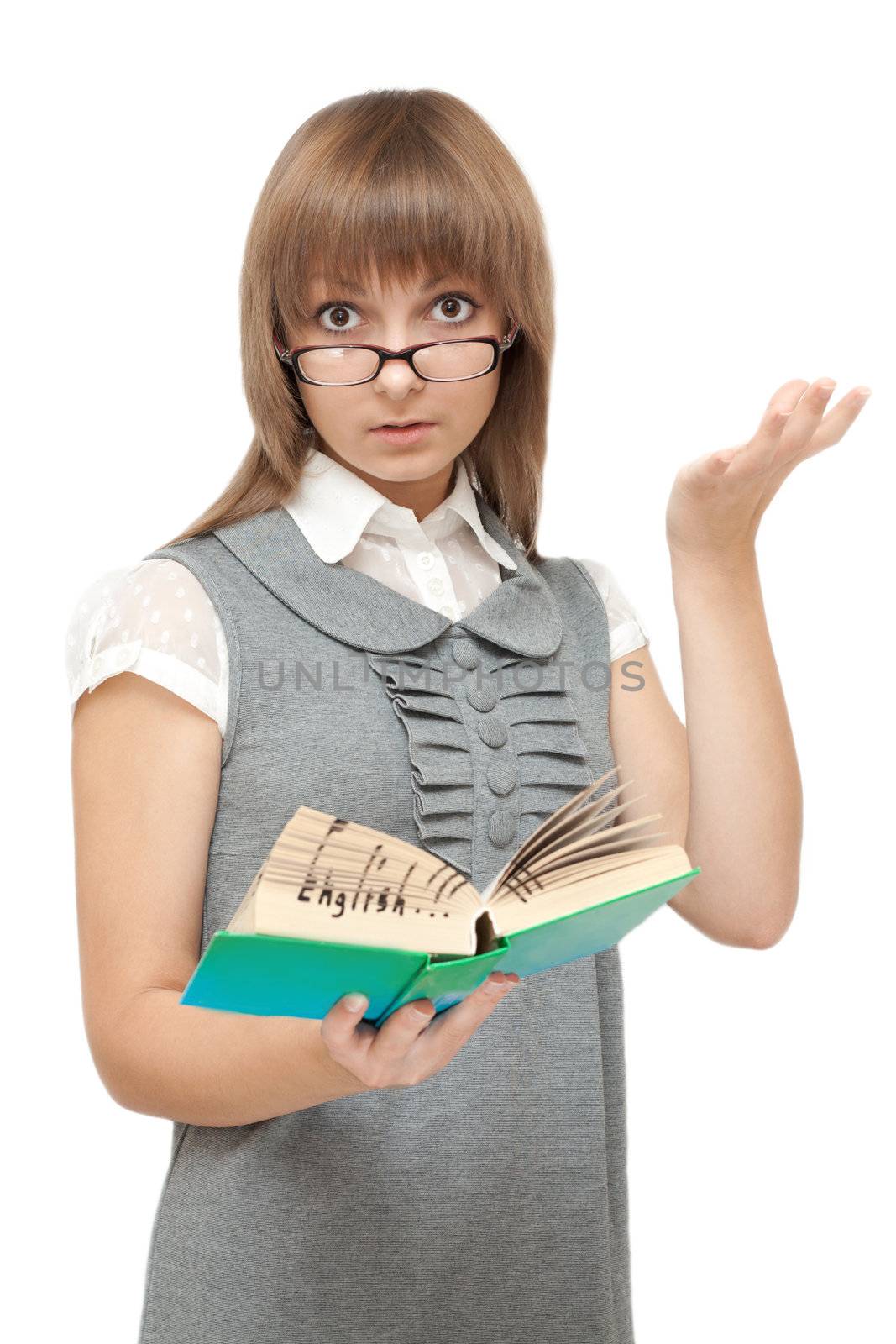 Young girl reads english and is amazed on white background
