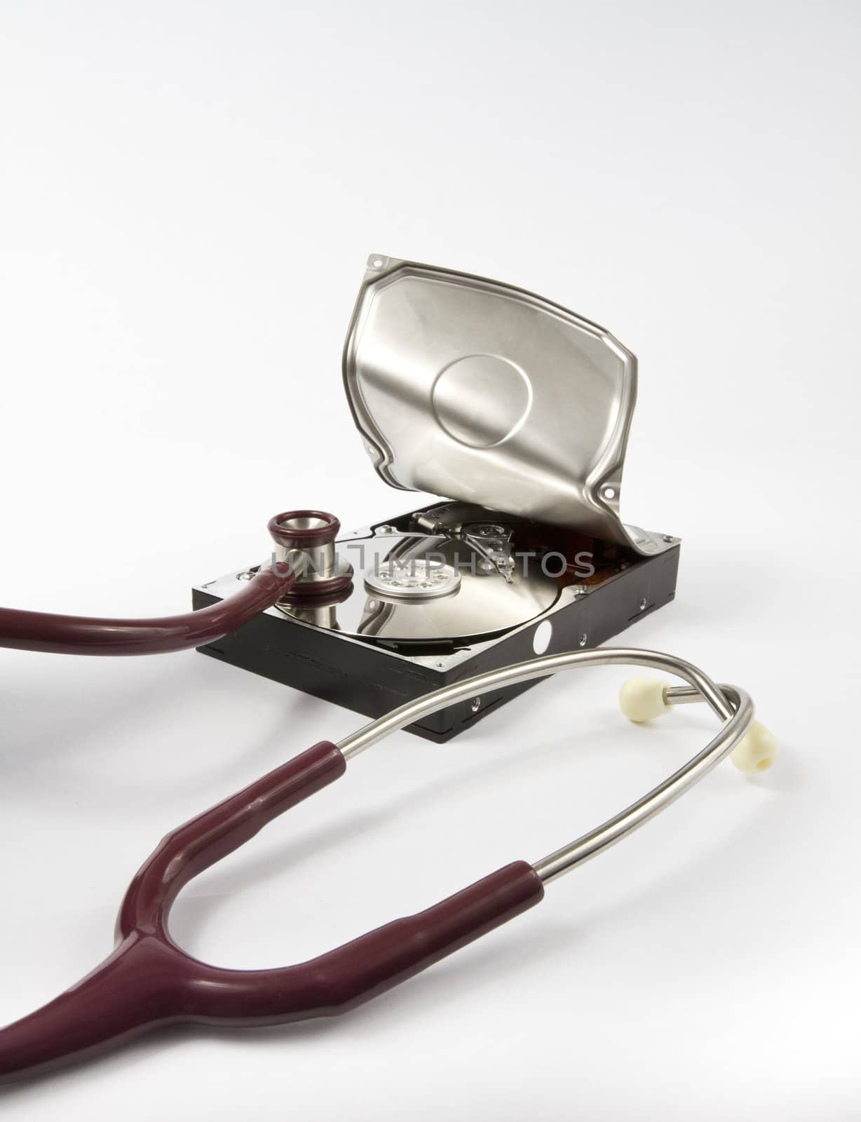 Open hard drive with stethoscope by gewoldi