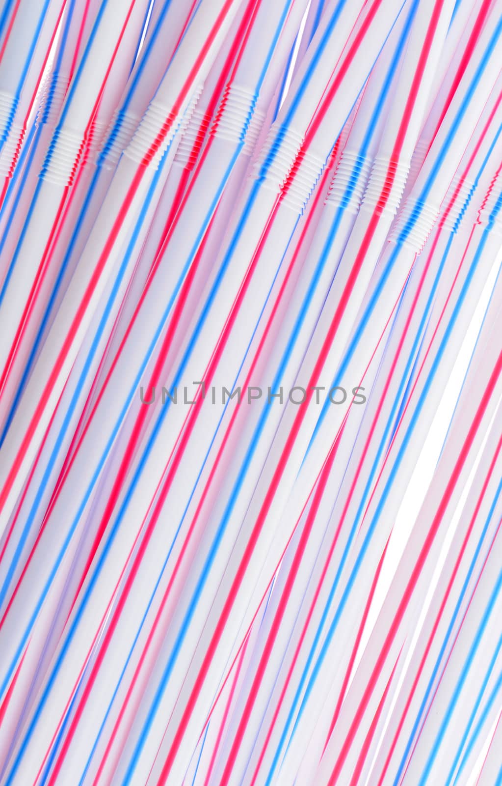 Tubules for a cocktail. An abstract background from plastic tubules