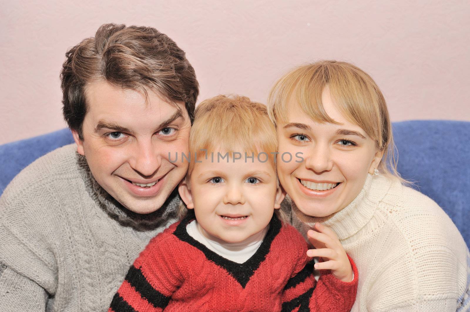 Happy family. Family from three person in house conditions