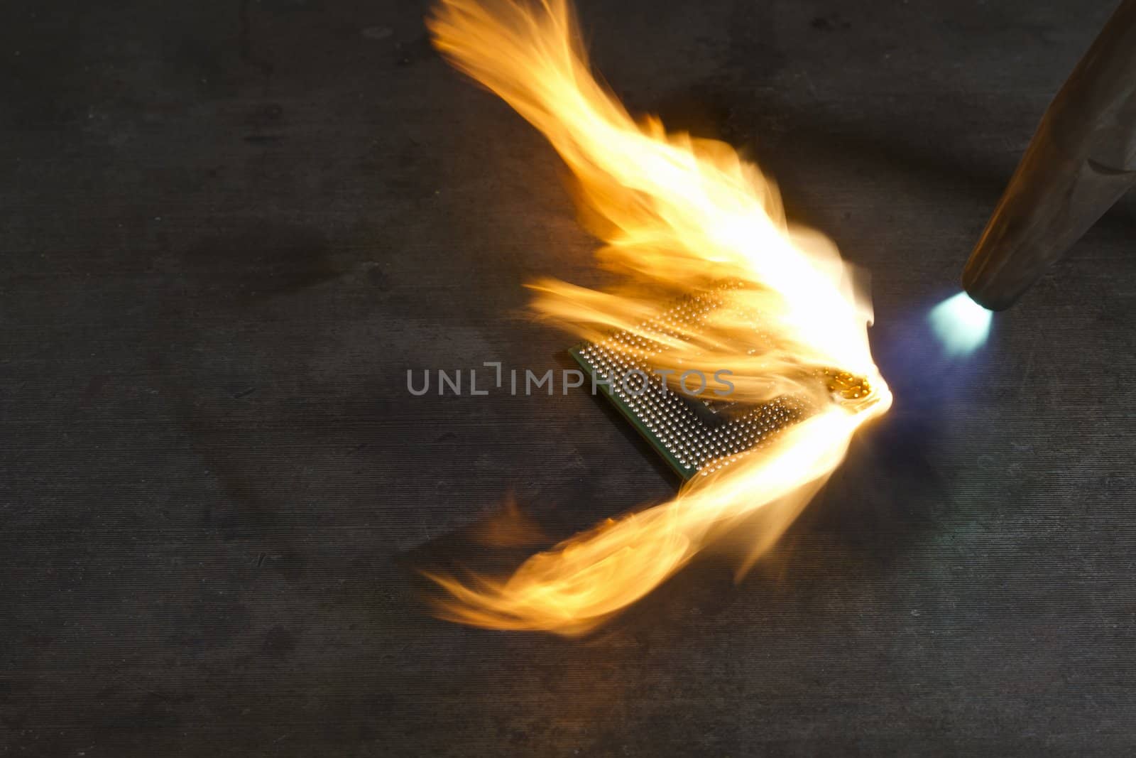 burning a CPU with a welding torch. 