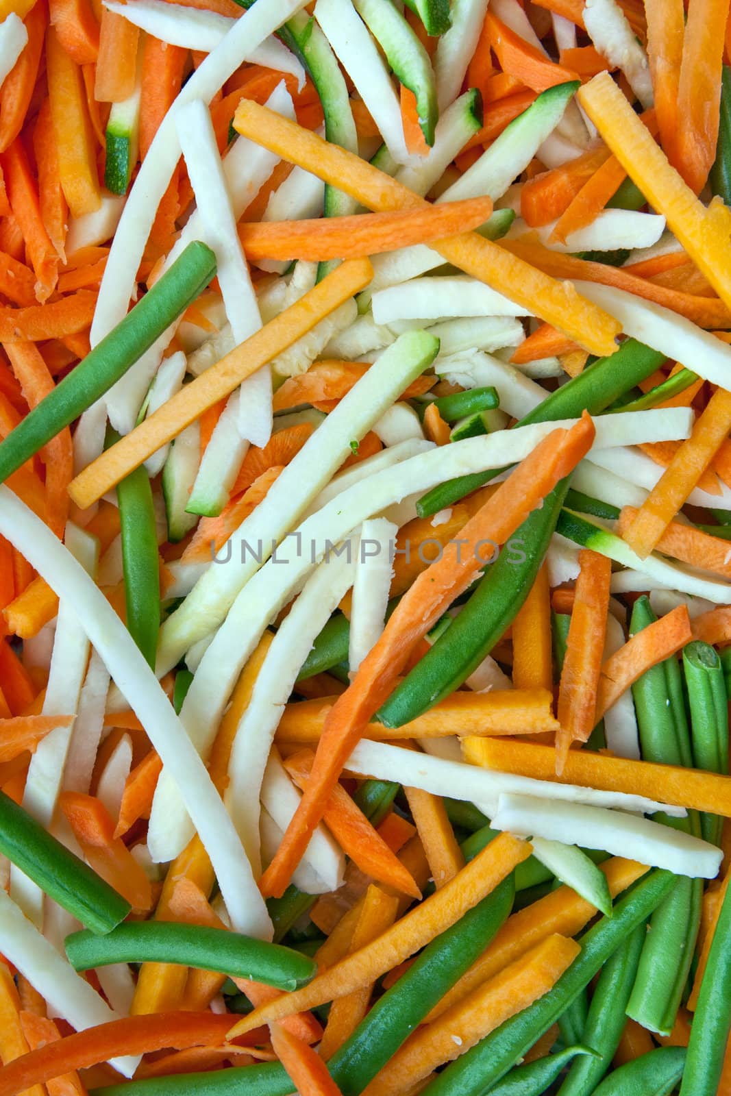 Background of julienne vegetables:  green beans, baby marrows and carrots