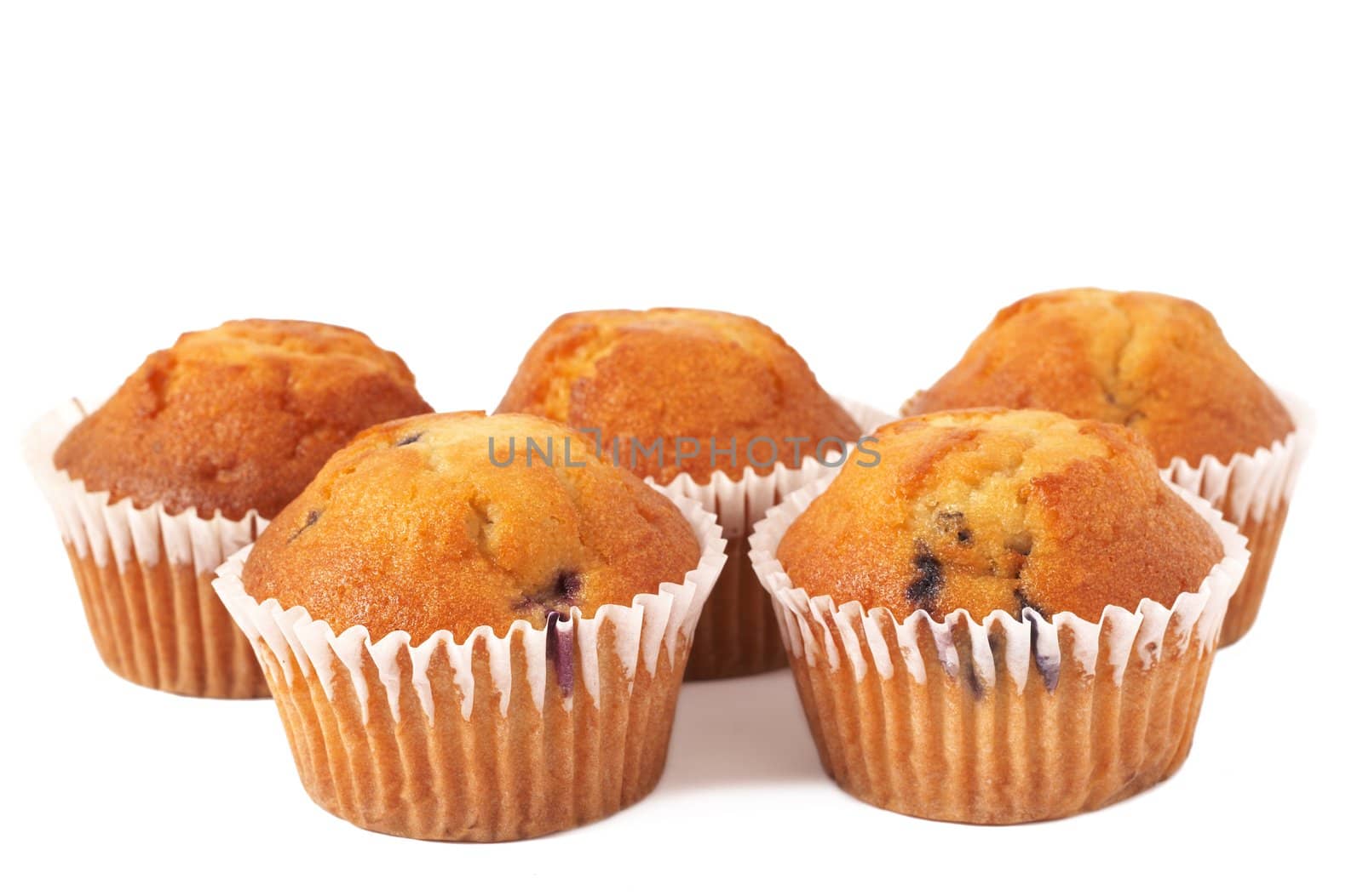 Fresh blueberry muffins isolated on white background