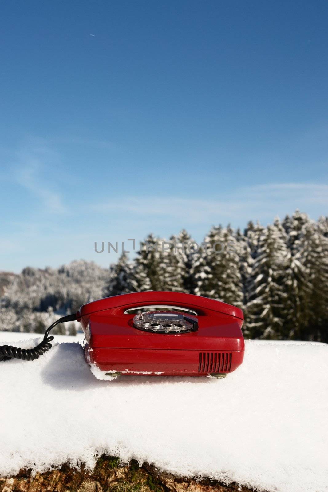 Santa Claus Hotline symbolized by a red retro phone